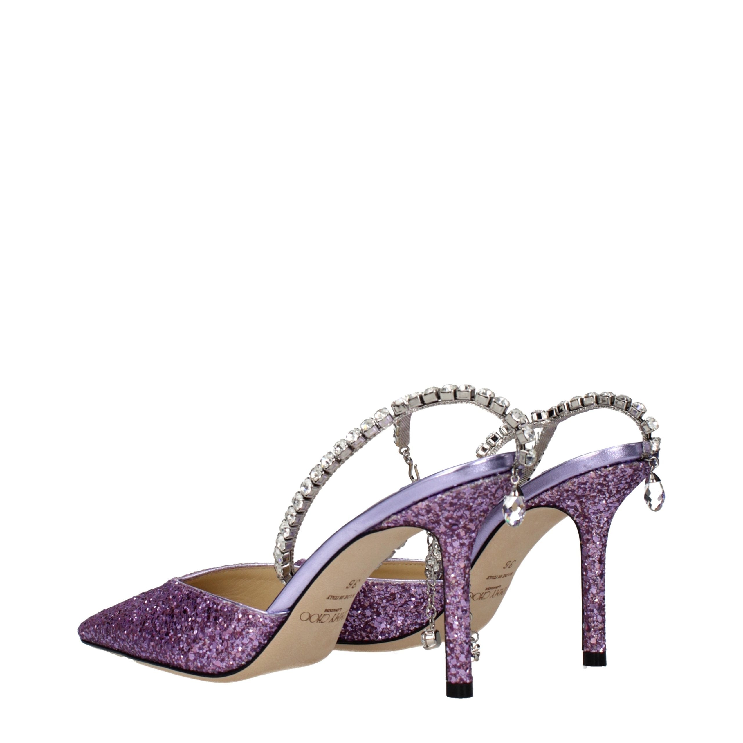 Indulge in the exquisite craftsmanship of Jimmy Choo Purple Plastic Stiletto Heel Sandals, where luxurious design meets captivating allure for unforgettable moments.