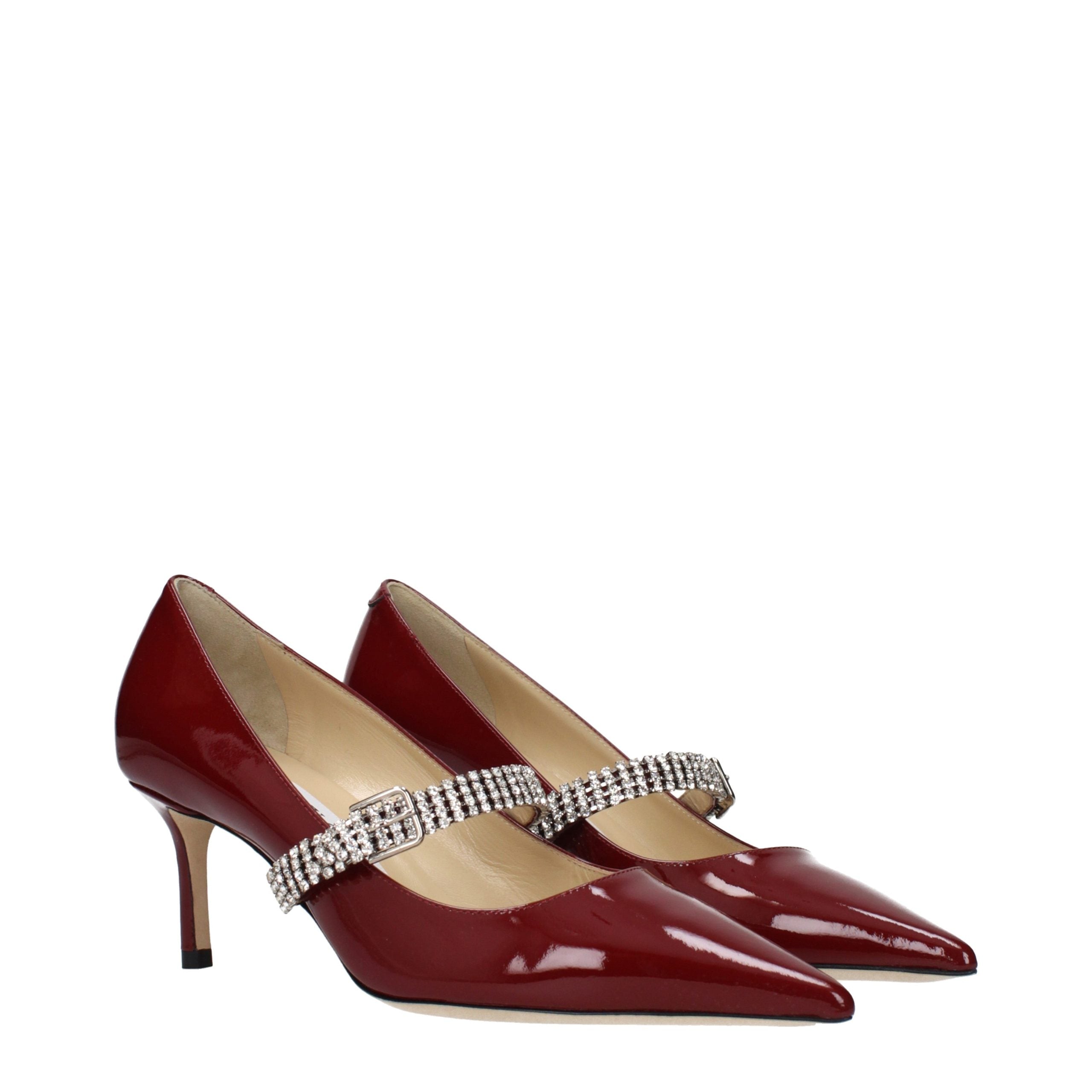 Step into a realm of elegance with Jimmy Choo Red Leather High Heel Pumps, where exquisite craftsmanship meets luxurious allure for the discerning fashionista.