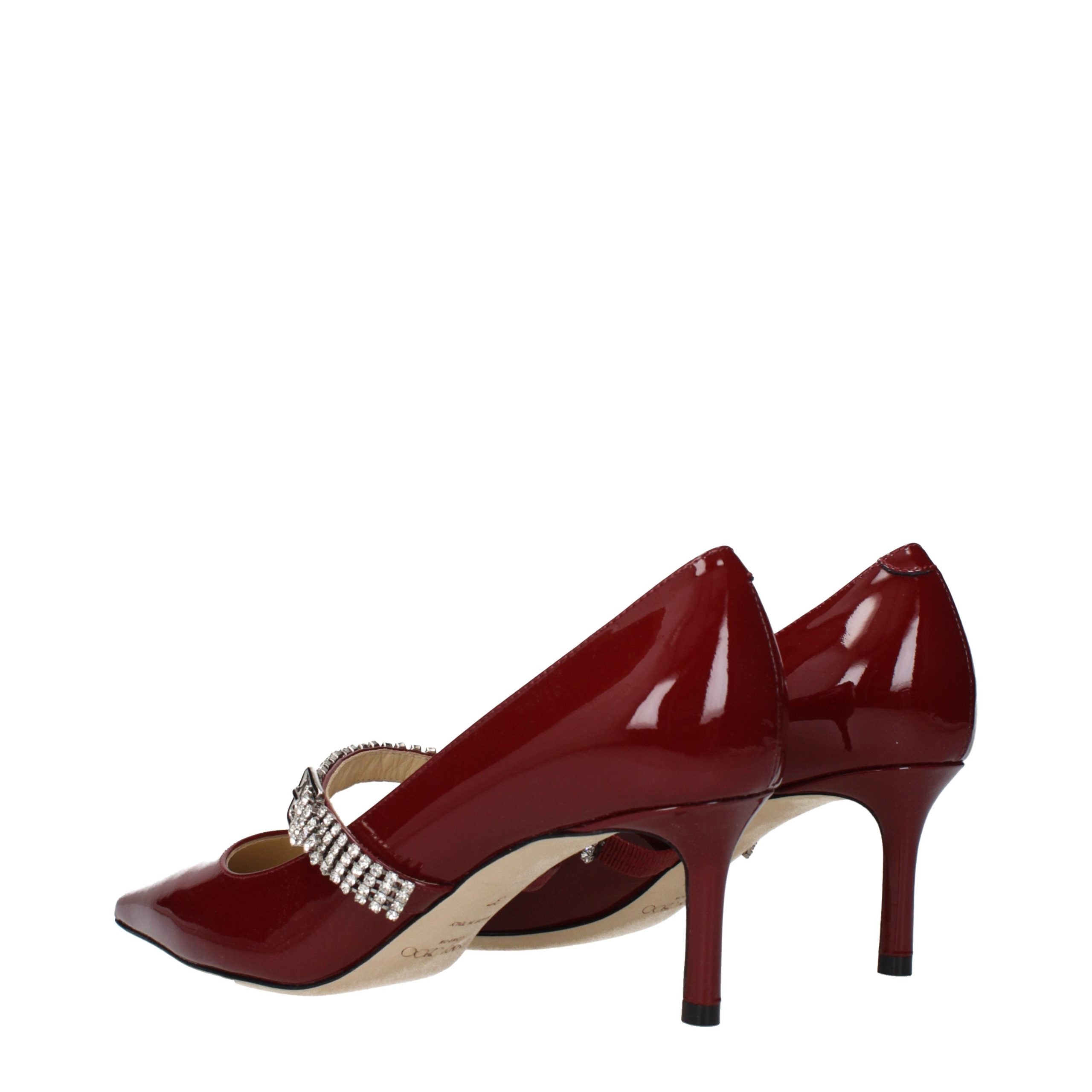 Step into a world of elegance with Jimmy Choo Red Leather High Heel Pumps, where exquisite craftsmanship meets timeless allure, perfect for any sophisticated occasion.