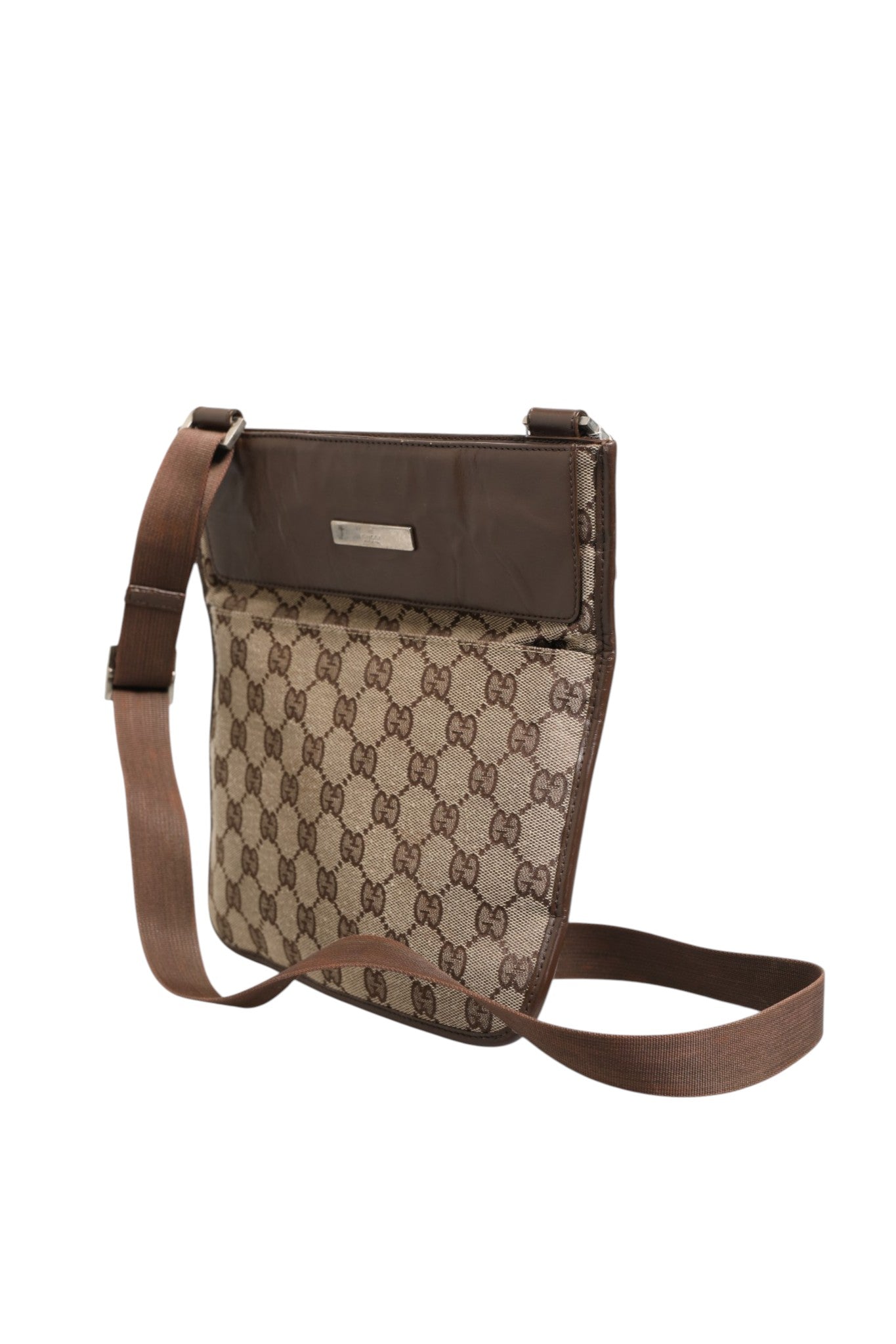 Discover the Gucci Supreme Shoulder Bag, a masterpiece of exquisite craftsmanship in rich brown leather, embodying timeless elegance and sophistication for the discerning individual.