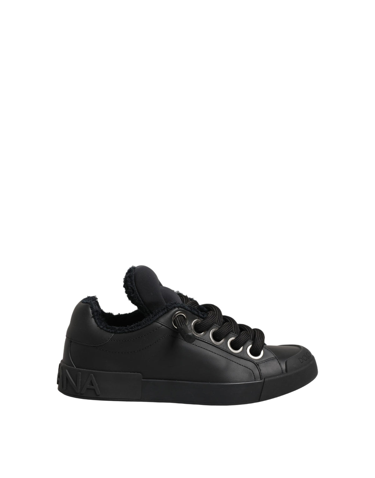 Experience the exquisite craftsmanship of Dolce & Gabbana's Black Leather Low Top Portofino Sneakers, where luxury meets timeless elegance for the discerning individual.