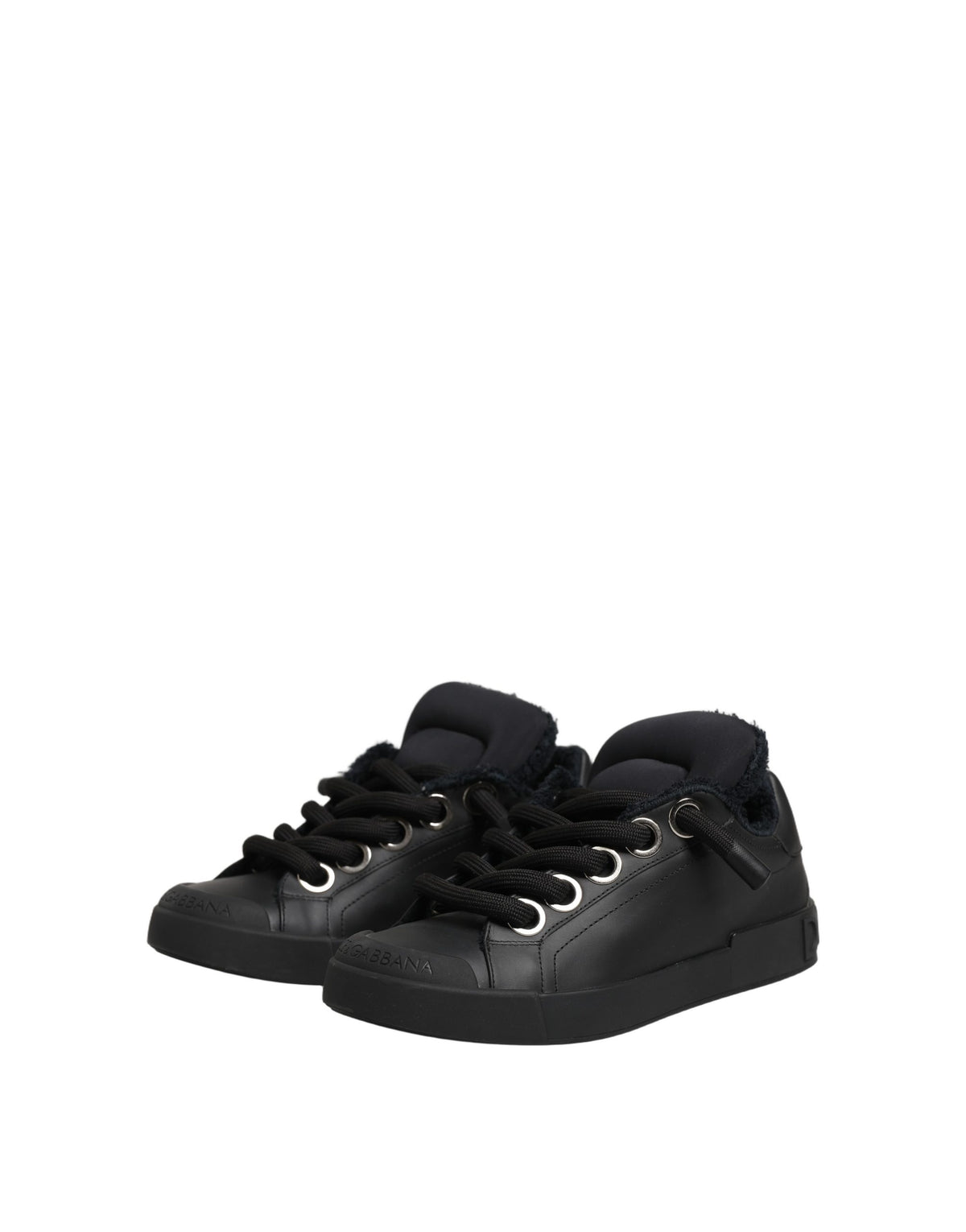 Elevate your style with Dolce & Gabbana's Black Leather Low Top Portofino Sneakers, where exquisite craftsmanship meets timeless elegance, perfect for the discerning connoisseur.
