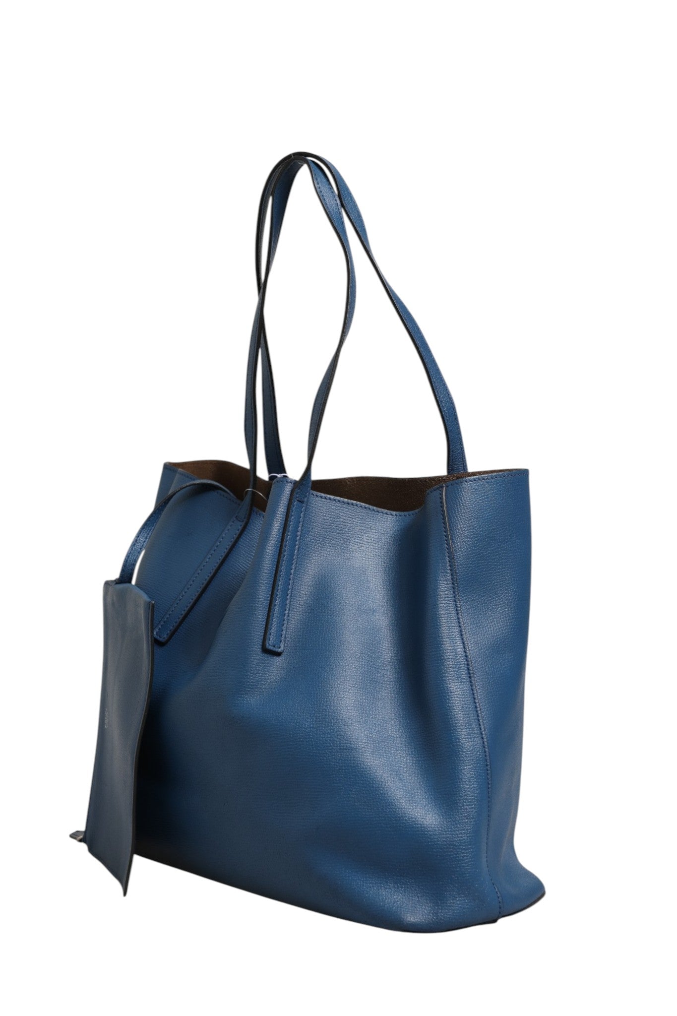 Experience the exquisite allure of the Fendi Leather Navy Blue Shopping Tote, a timeless statement of luxury and sophistication, perfect for the discerning individual.