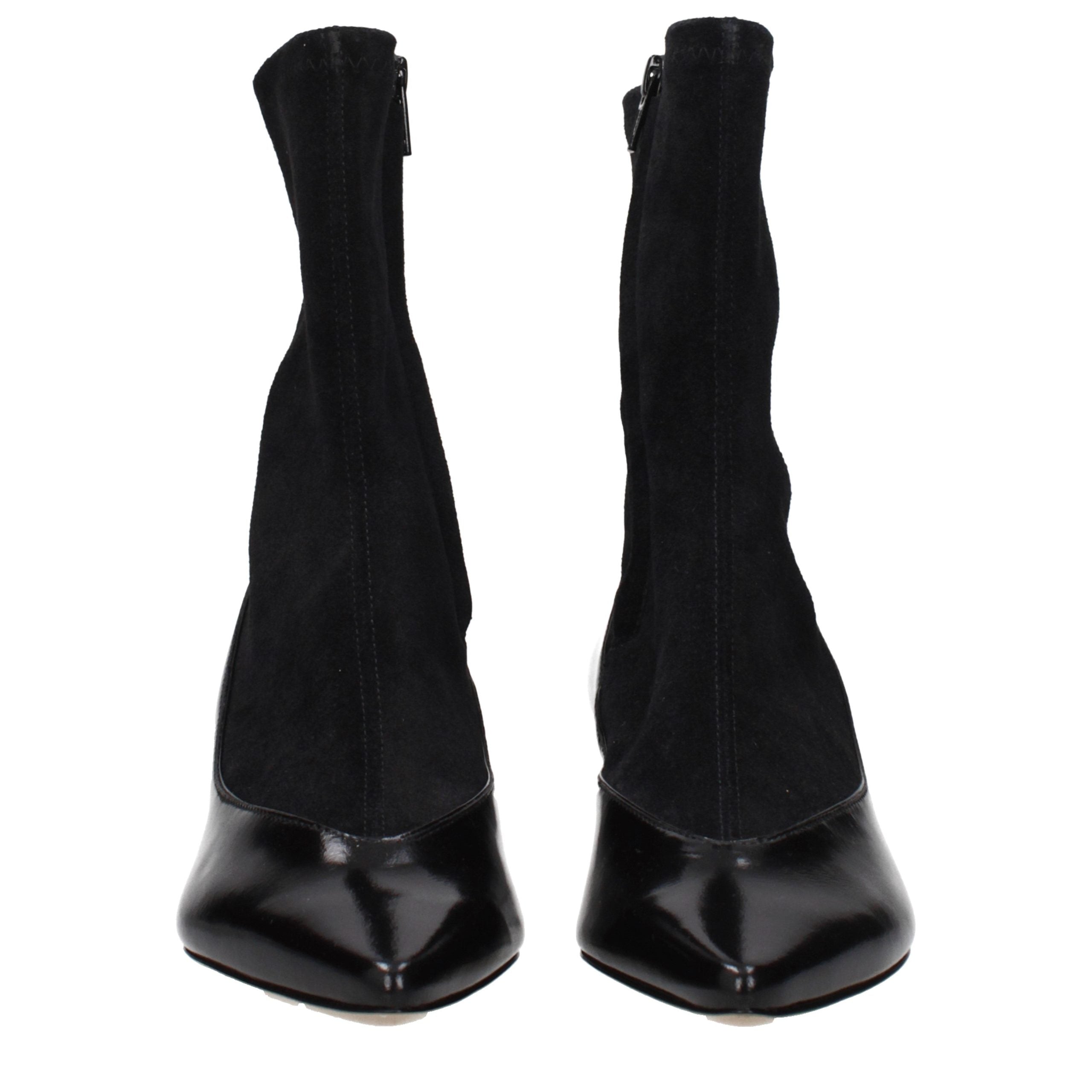 Indulge in the exquisite Jacquemus Black Leather Ankle Boots, where premium suede meets artisanal craftsmanship, embodying timeless elegance for the discerning connoisseur.