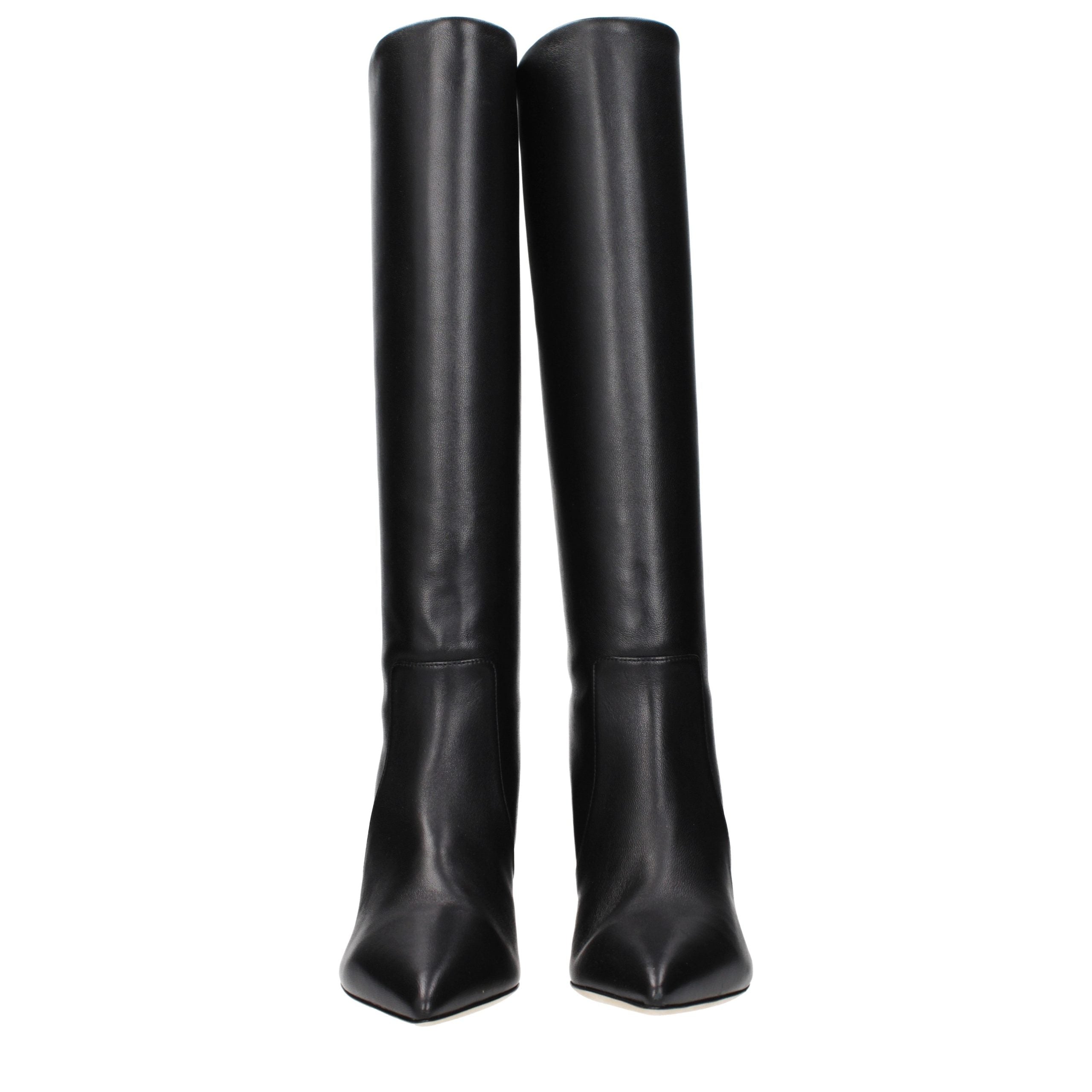 Elevate your style with Paris Texas Black Leather Ankle Boots, where luxurious leather meets intentional distressing, embodying sophistication for every occasion.