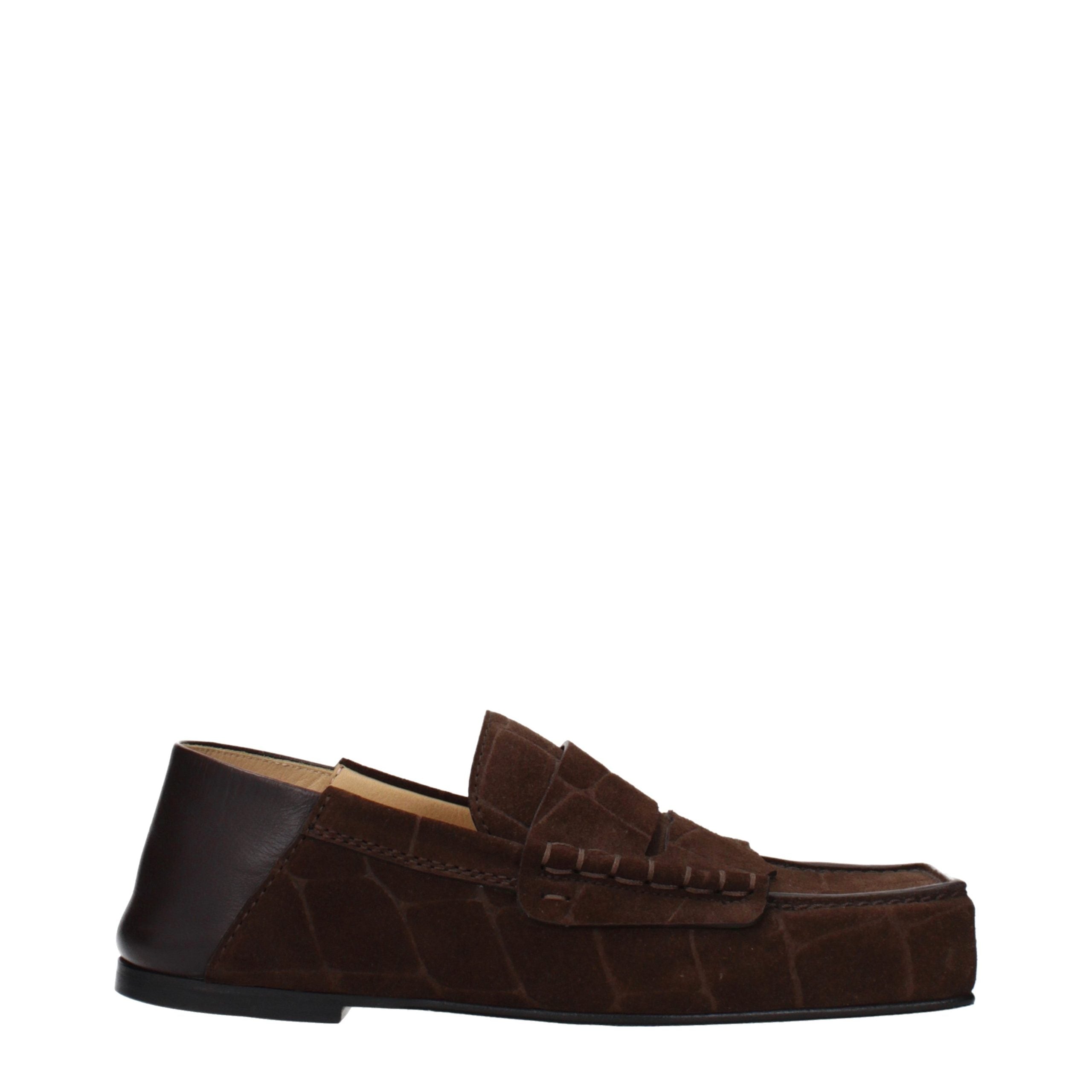 Step into a realm of refined elegance with Jacquemus Brown Leather Slip-On Loafers, where artisanal craftsmanship and vintage allure elevate your style to new heights.