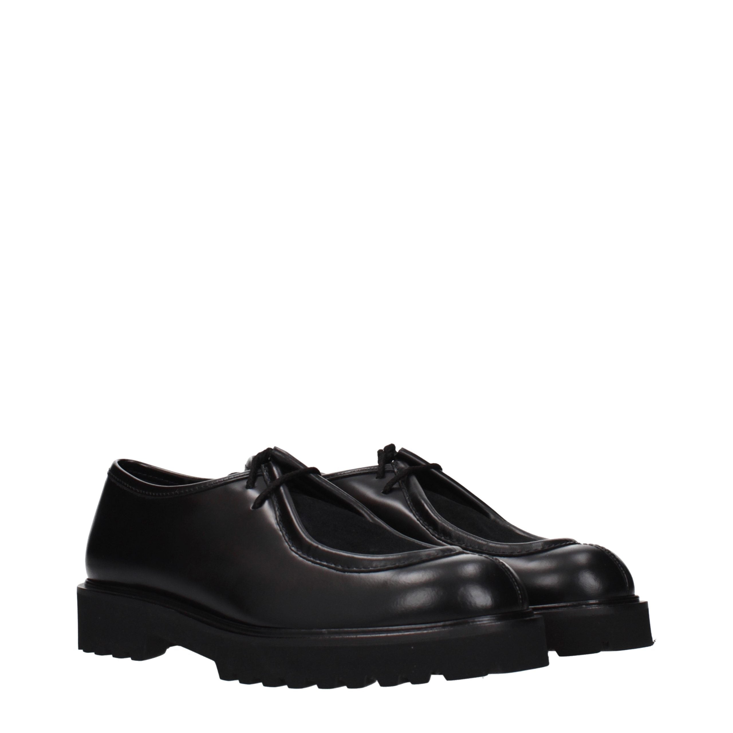 Indulge in the exquisite craftsmanship of Max Mara Black Leather Oxfords and Derbies, where timeless elegance meets modern allure for the discerning individual.