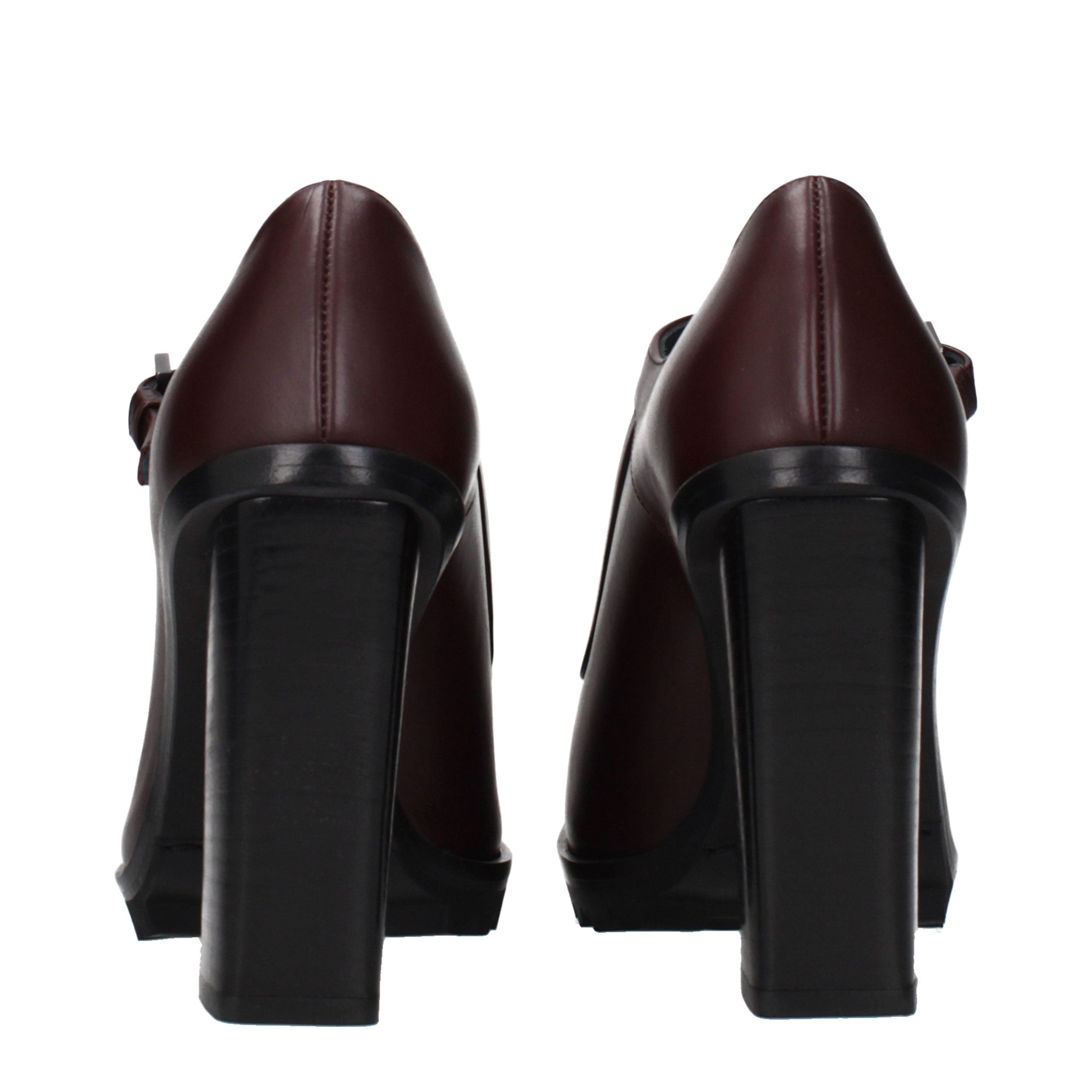 Step into timeless elegance with Max Mara's Brown Leather High Heel Pumps, where exquisite Italian craftsmanship meets vintage allure, perfect for any sophisticated wardrobe.