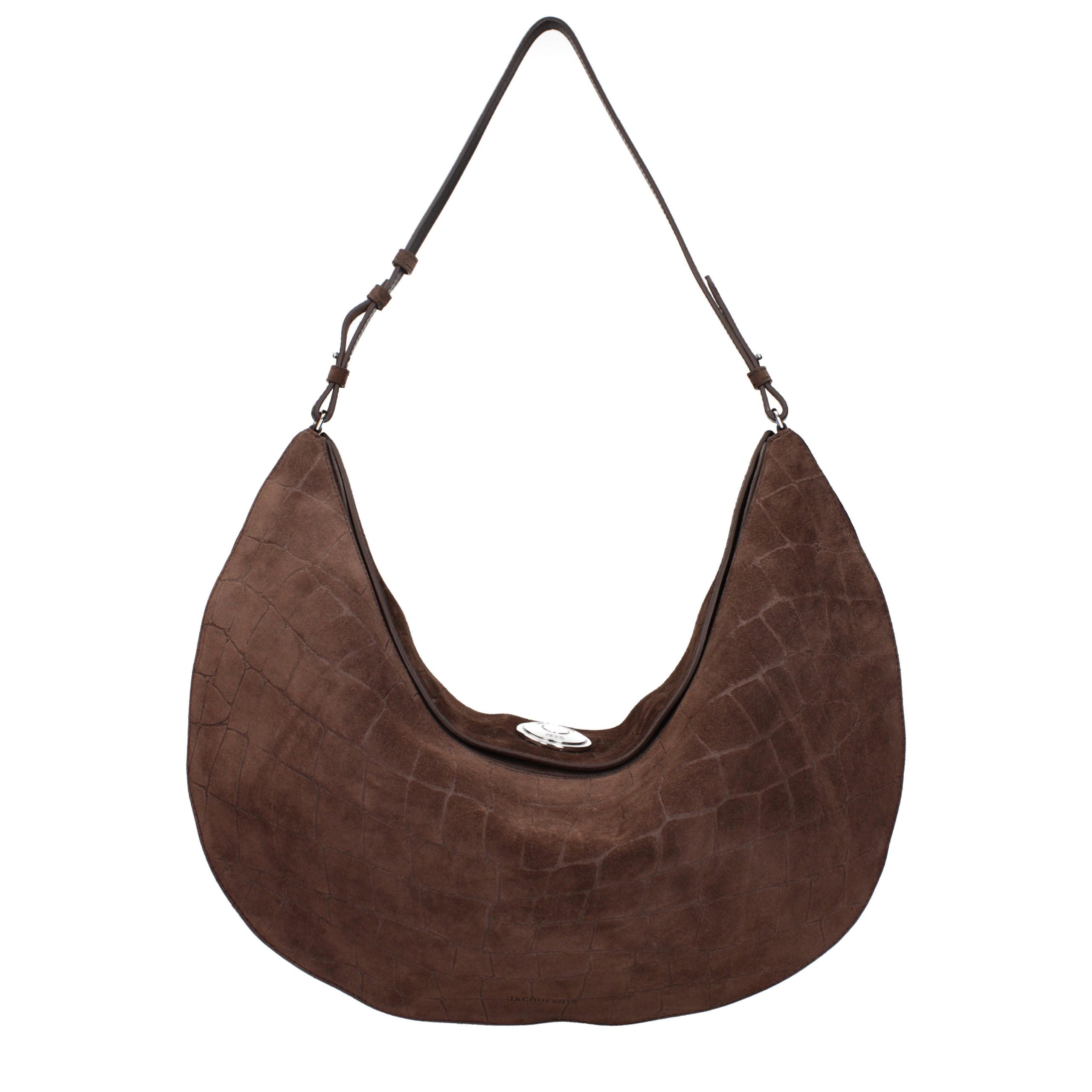 Indulge in the exquisite Jacquemus Brown Leather Shoulder Bag, a timeless blend of luxurious suede and meticulous craftsmanship, perfect for elevating any ensemble.