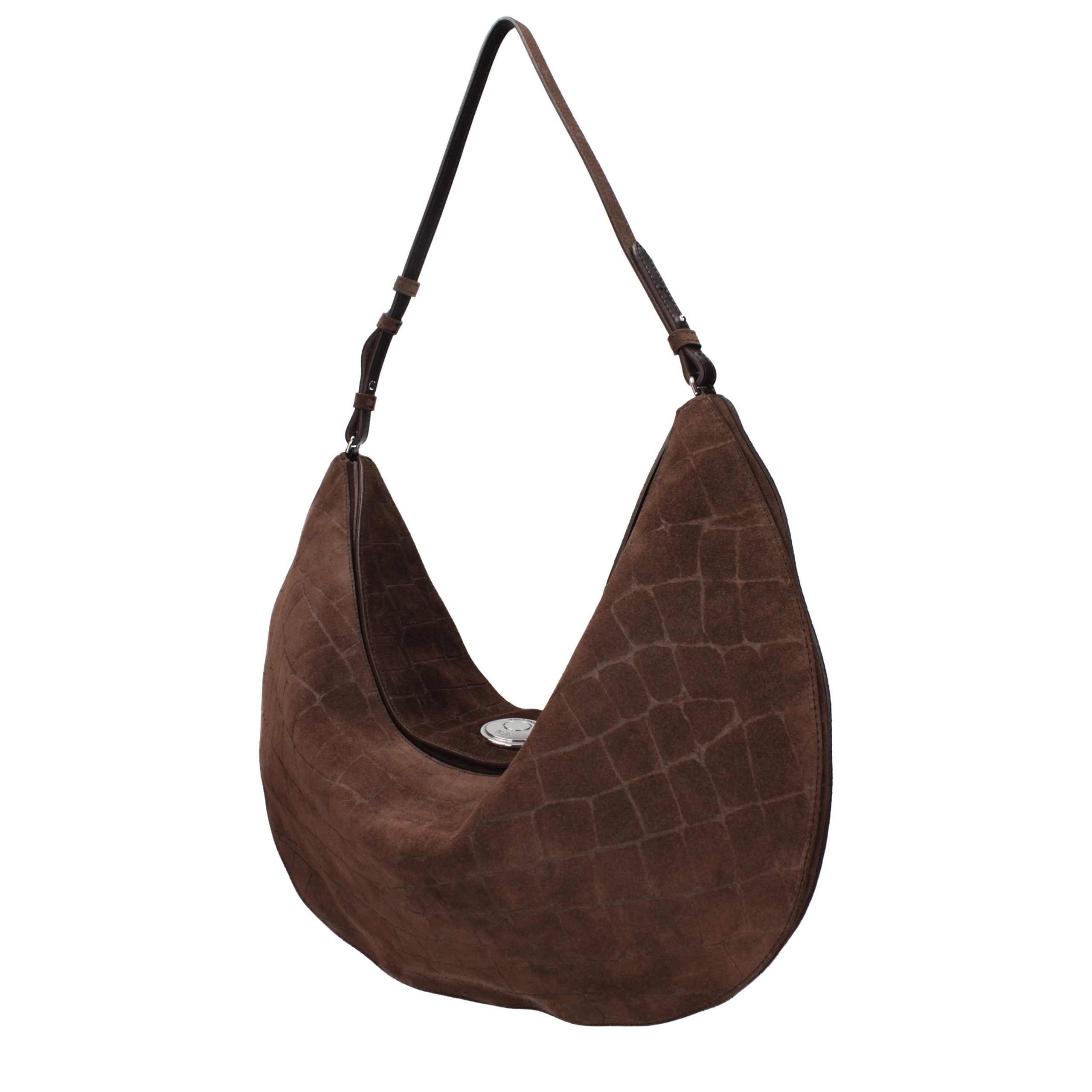 Indulge in the exquisite Jacquemus Brown Leather Shoulder Bag, a timeless masterpiece of suede craftsmanship that embodies elegance and versatility for the discerning individual.