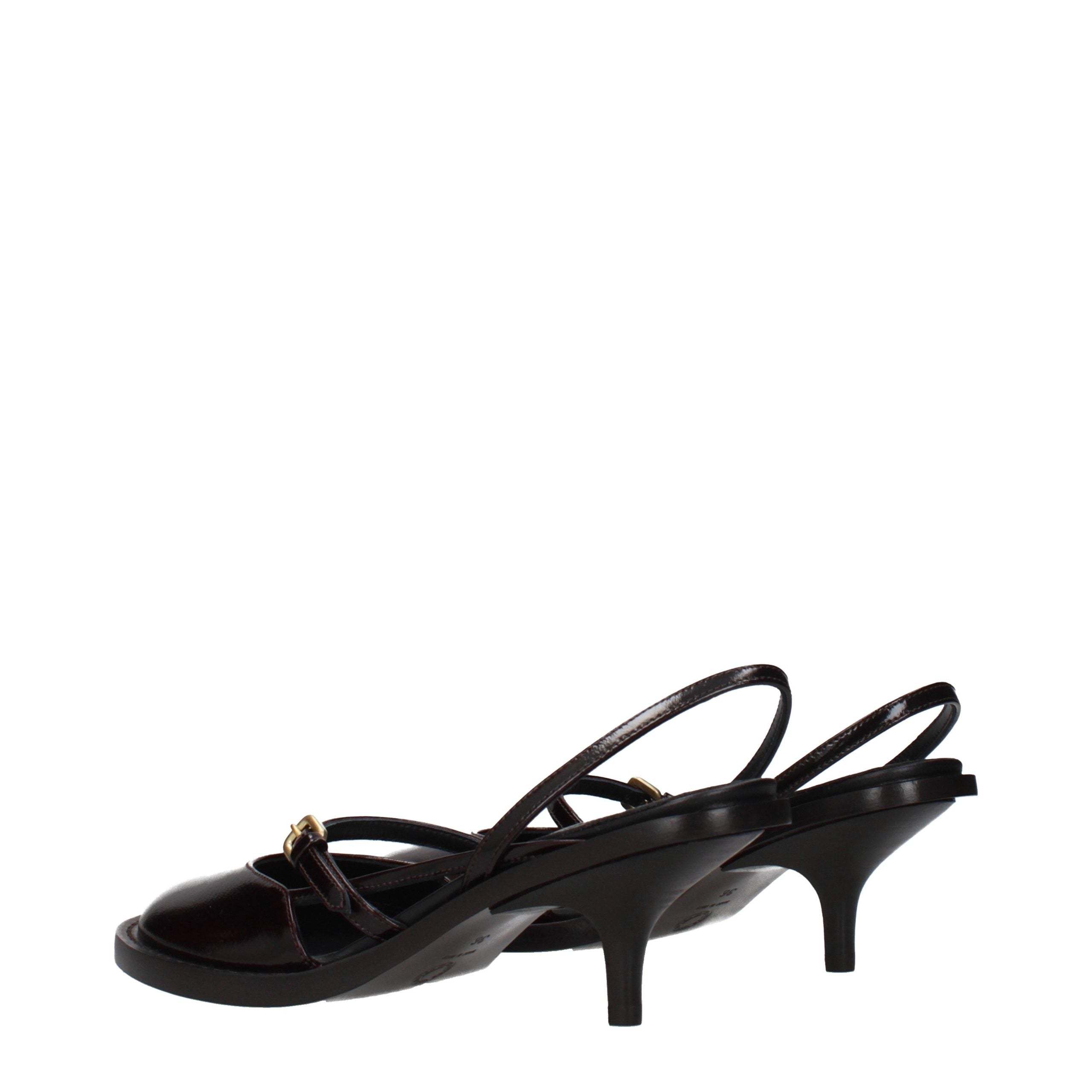 Experience the allure of Dries Van Noten Brown Leather Sandals, where exquisite craftsmanship meets timeless elegance, perfect for the discerning individual.