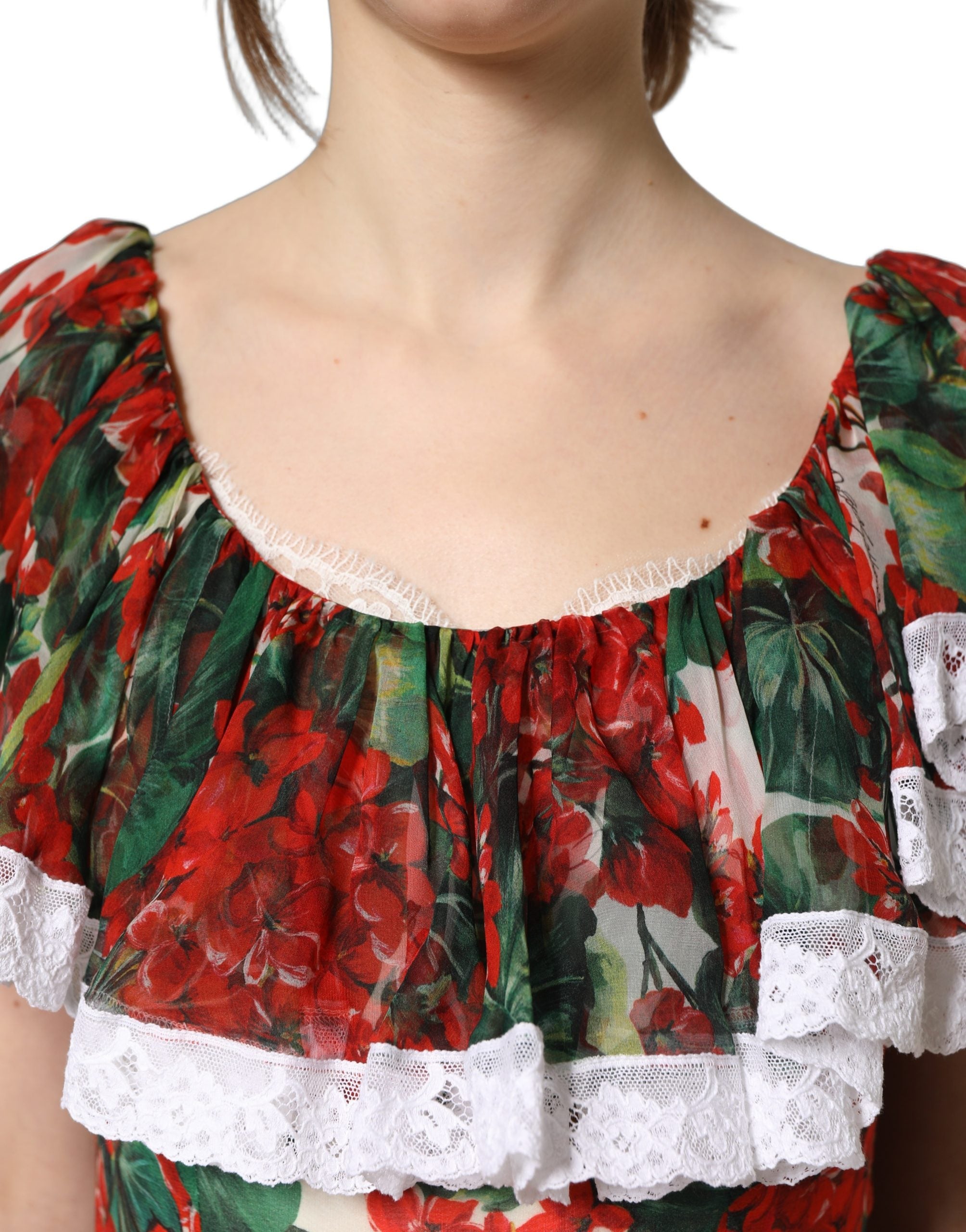 Discover the exquisite Dolce & Gabbana Multicolor Geranium Flower Lace Maxi Dress, a luxurious blend of silk and cotton that embodies haute couture elegance and timeless sophistication.