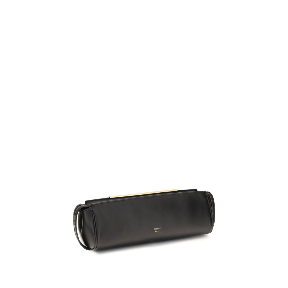 Indulge in the Khaite Black Calf Leather Bos Taurus Clutch Bag, where contemporary elegance meets luxurious craftsmanship, perfect for every sophisticated occasion.