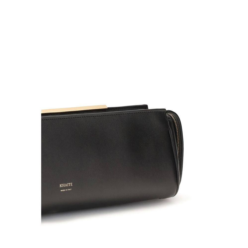 Indulge in the Khaite Black Calf Leather Bos Taurus Clutch Bag, a masterpiece of contemporary elegance, crafted for those who embody sophistication and allure.