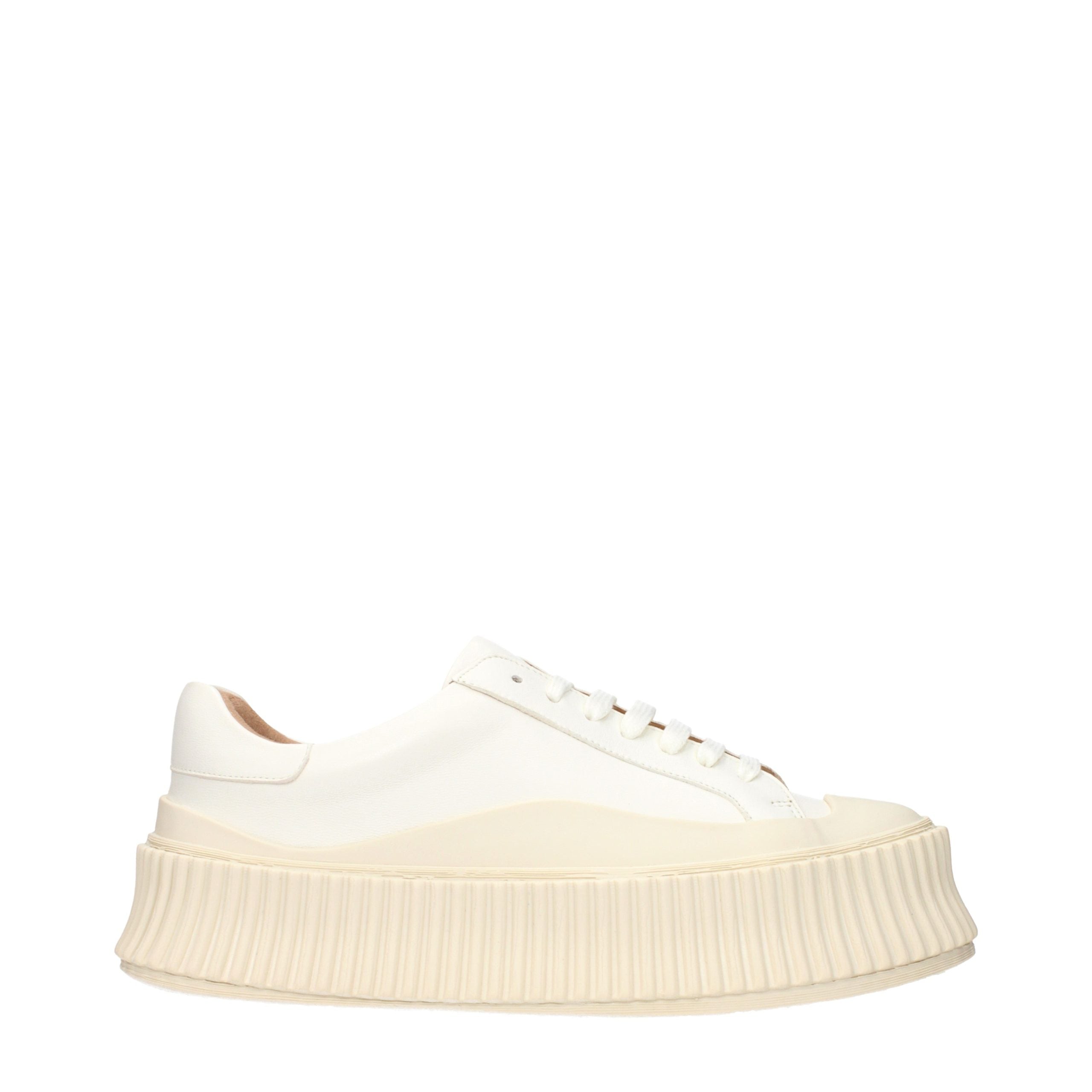 Experience the exquisite allure of Jil Sander White Leather Platform Sneakers, where artisanal craftsmanship meets timeless elegance, perfect for the discerning connoisseur.