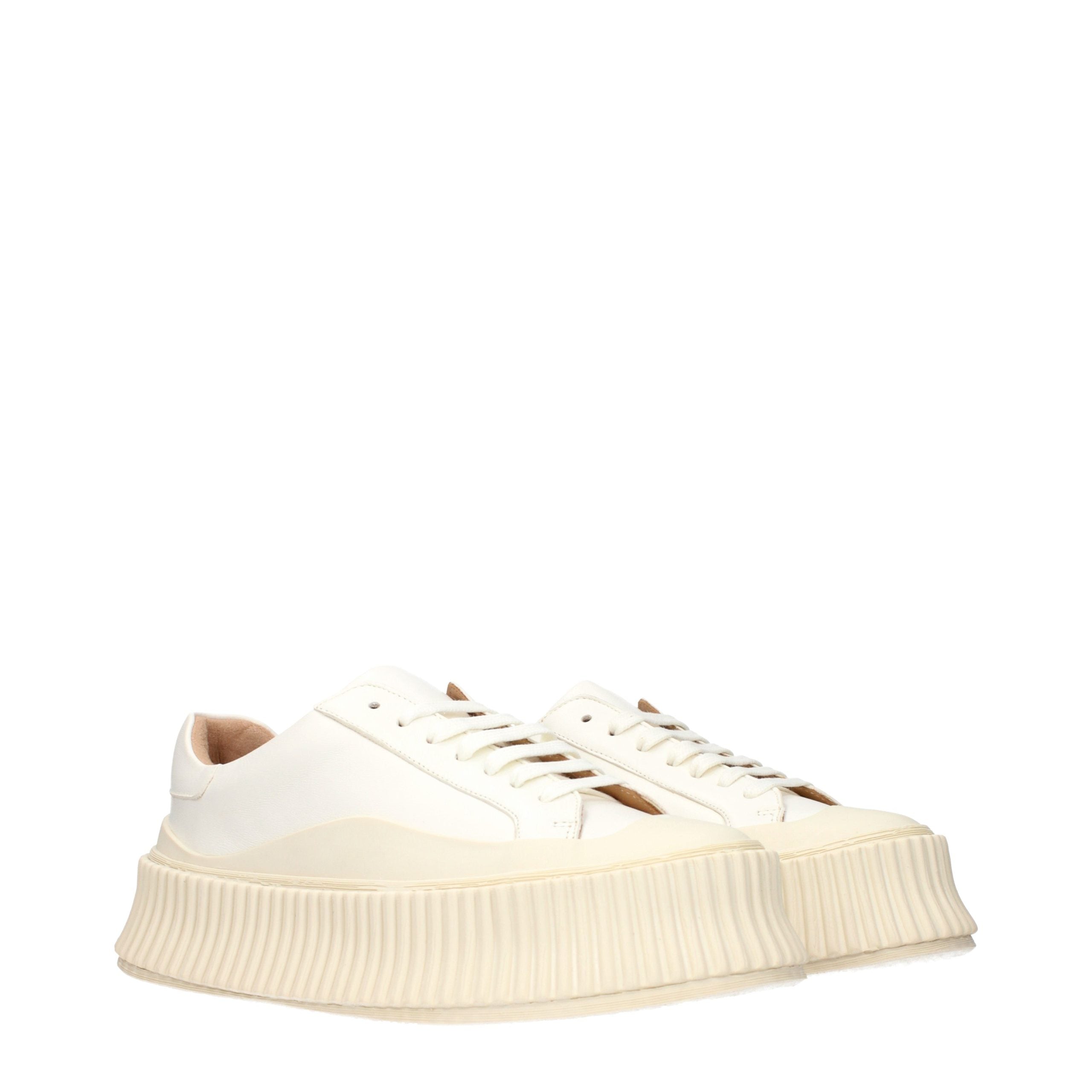 Experience the allure of Jil Sander White Leather Platform Sneakers, where exquisite craftsmanship meets timeless elegance, perfect for those who embrace luxury and sophistication.