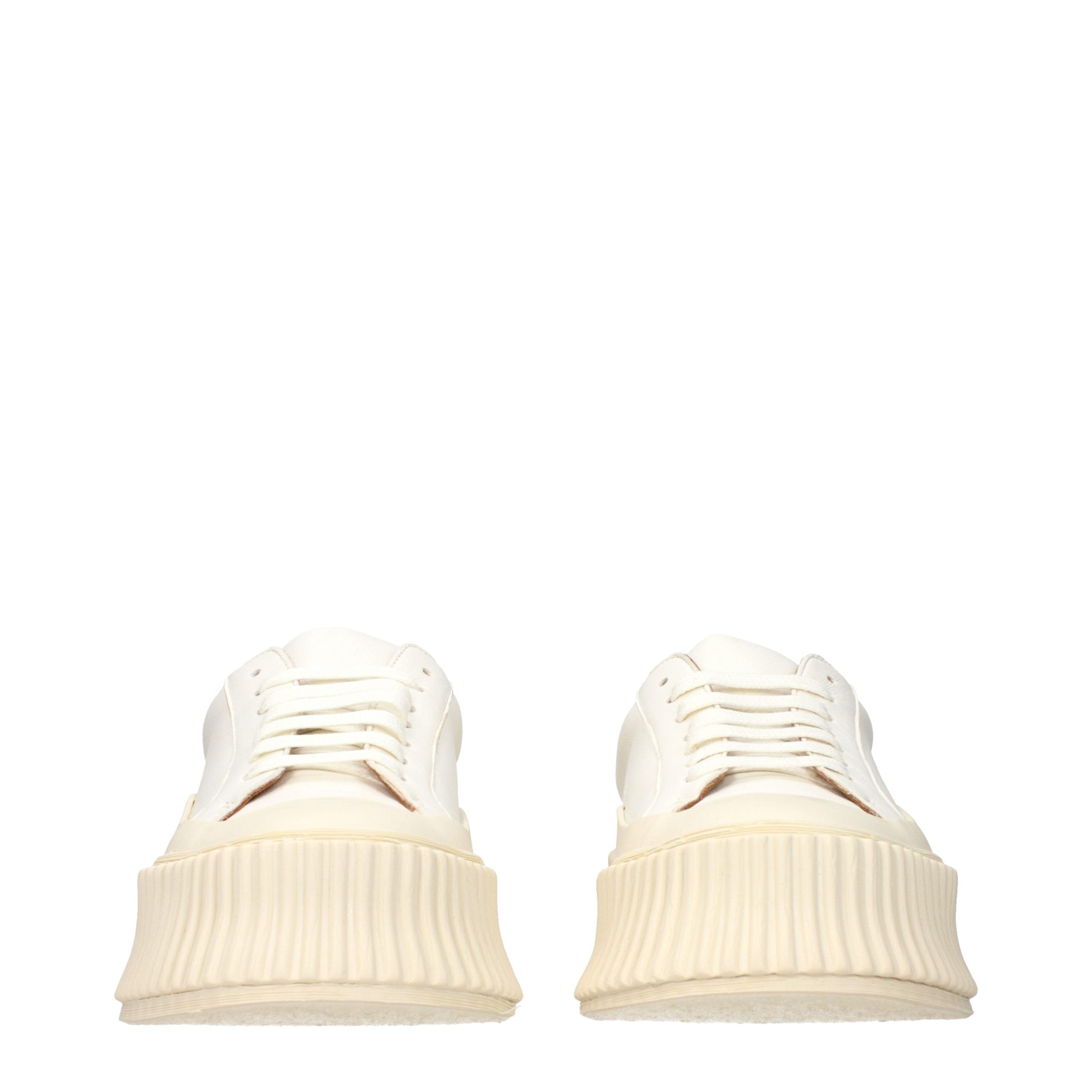 Experience the allure of Jil Sander White Leather Platform Sneakers, where artisanal craftsmanship meets timeless elegance, perfect for the discerning connoisseur.