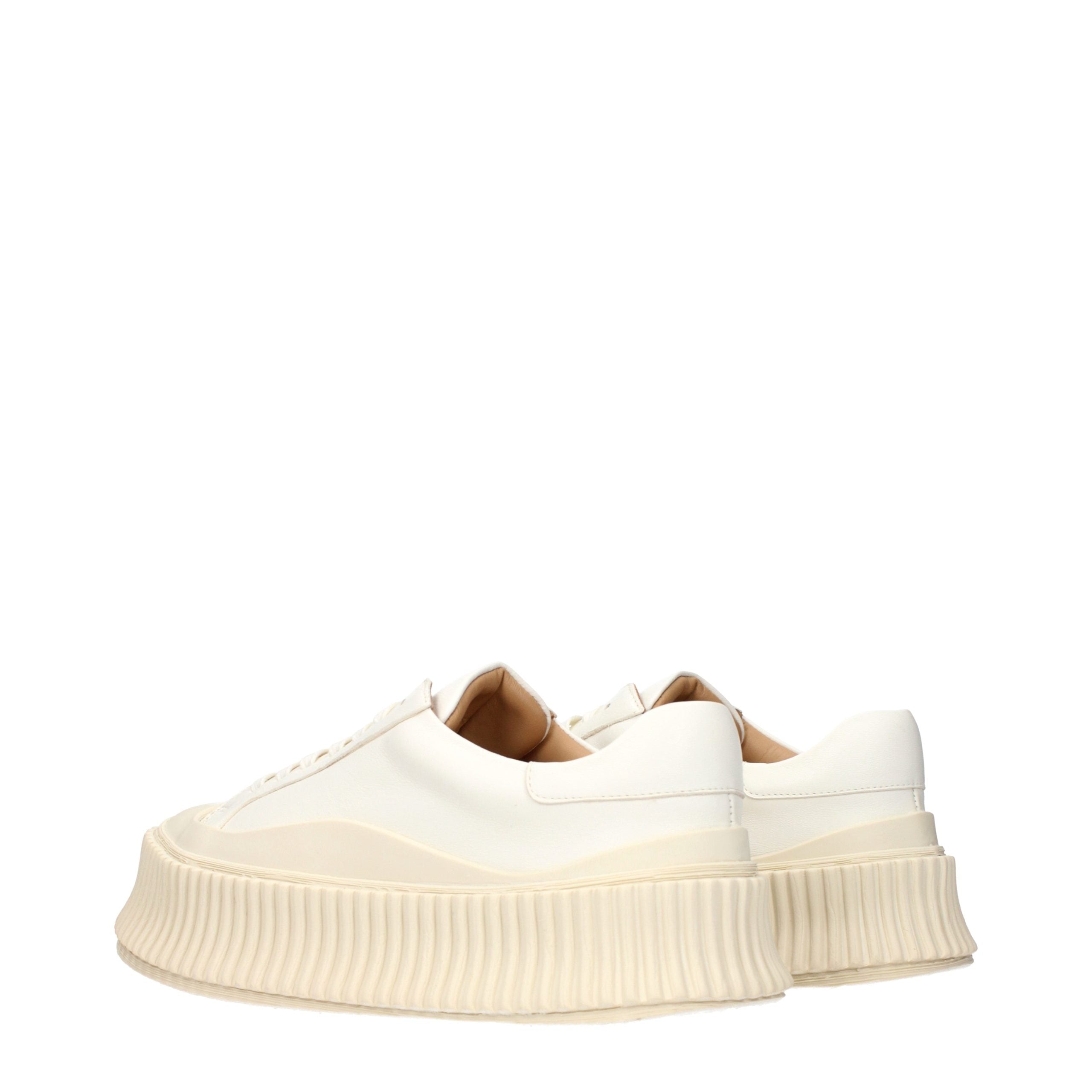 Elevate your style with Jil Sander White Leather Platform Sneakers, where artisanal craftsmanship meets timeless elegance, perfect for the discerning modern connoisseur.