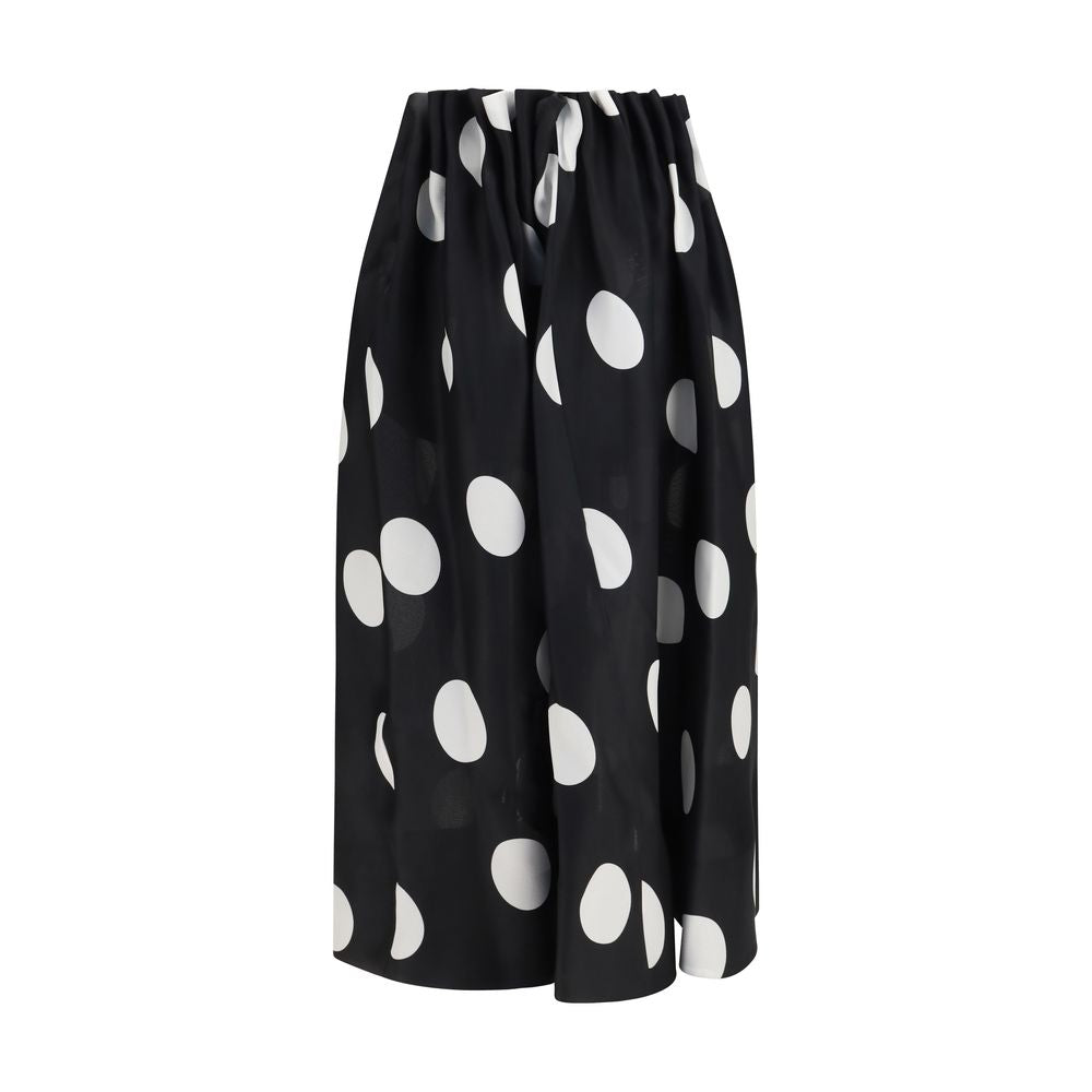 Indulge in the Khaite Black Silk Skirt, a Spring/Summer 2026 masterpiece of 100% silk gazar, where playful polka dots meet artisanal craftsmanship for timeless elegance.