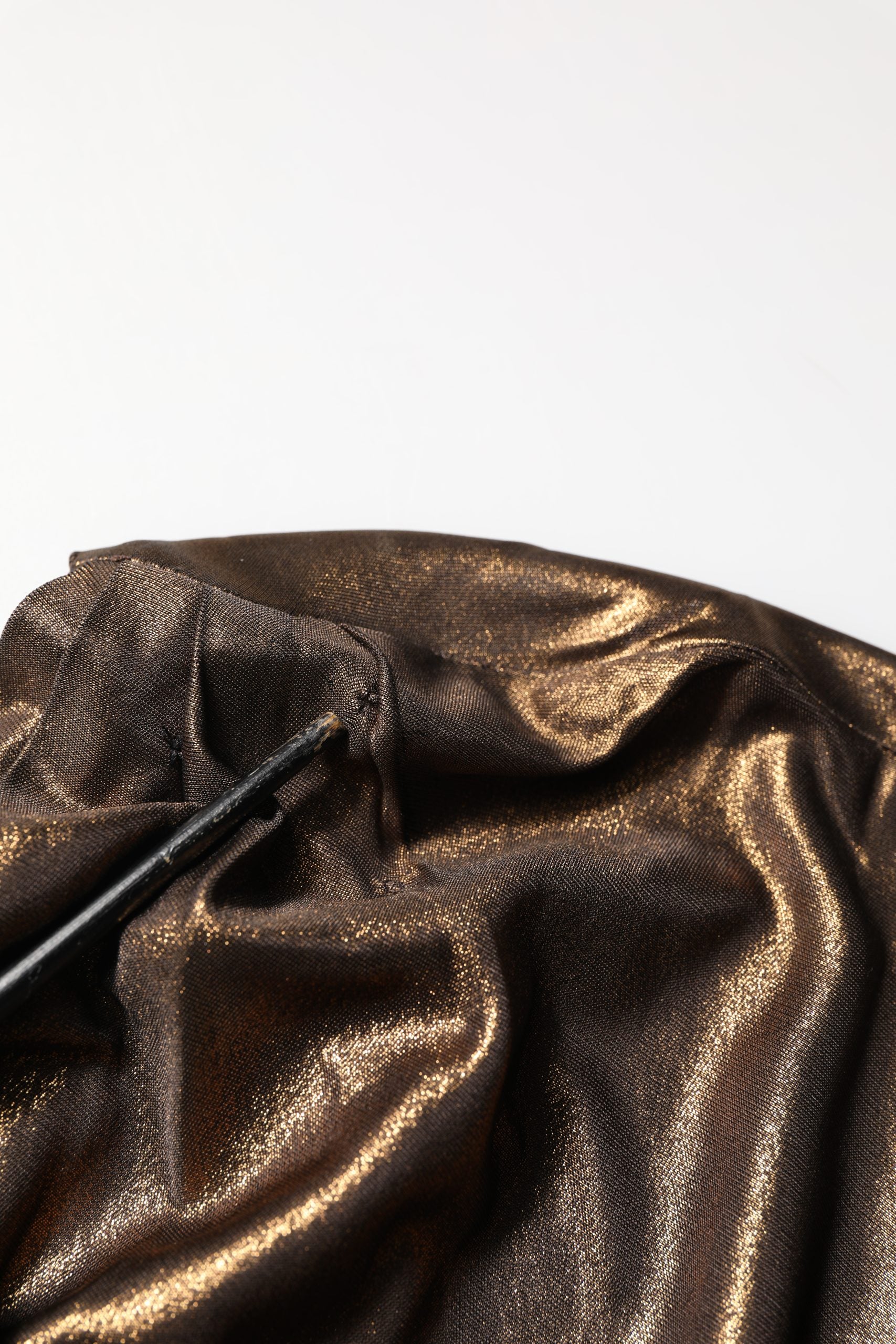Indulge in the exquisite allure of the Dolce & Gabbana Bronze Asymmetrical Draping One Shoulder Dress, a masterpiece of luxurious viscose and silk, embodying timeless elegance and sophistication.