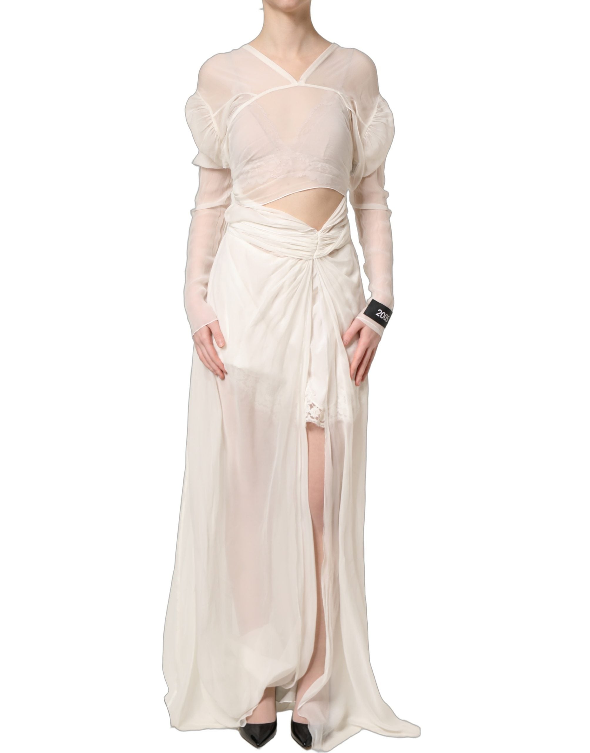 Experience the allure of the Dolce & Gabbana White Silk Sheer Draped Long Gown, a testament to Italian craftsmanship that embodies timeless elegance and sophistication.