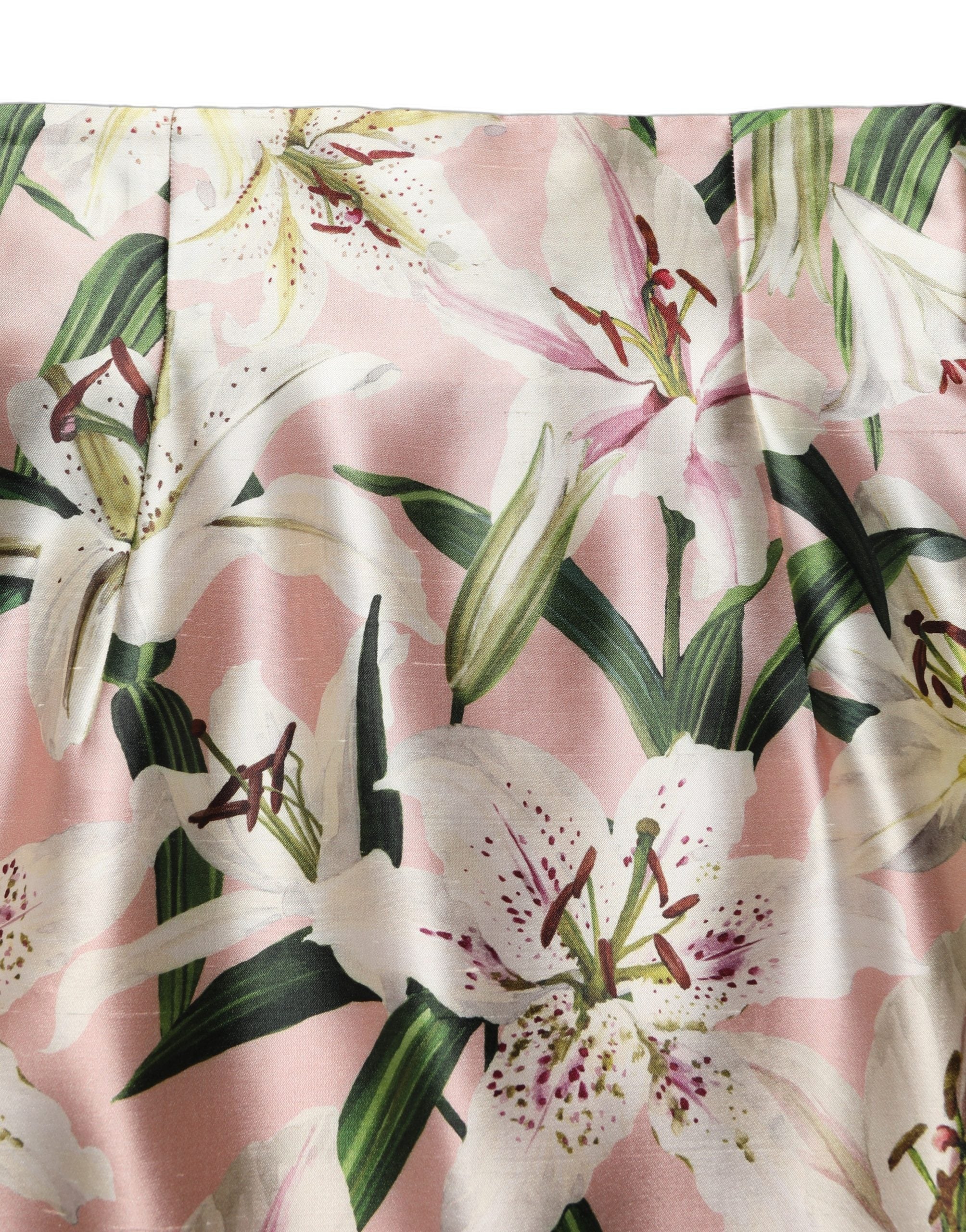 Indulge in the exquisite allure of the Dolce & Gabbana Pink Lilium High Waist Knee Length Skirt, crafted from luxurious silk, embodying refined elegance and timeless sophistication.