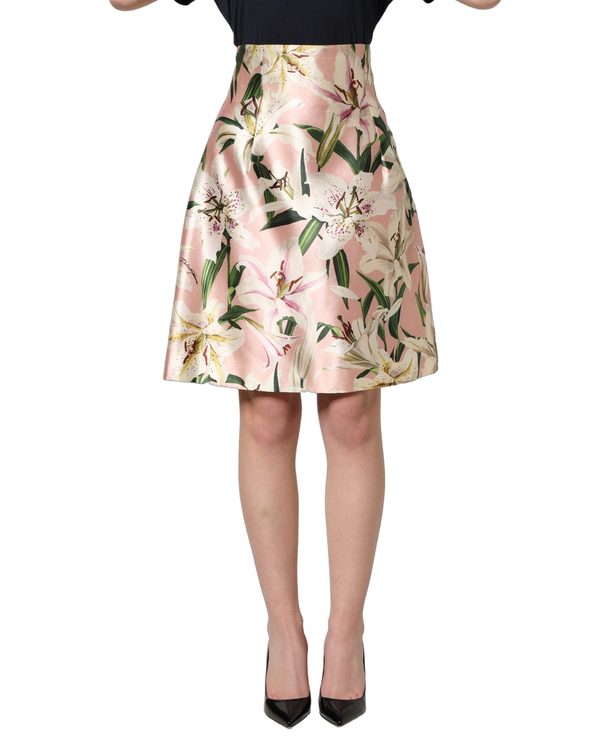 Indulge in the exquisite allure of the Dolce & Gabbana Pink Lilium High Waist Knee Length Skirt, a luxurious silk masterpiece that embodies refined elegance and timeless sophistication.