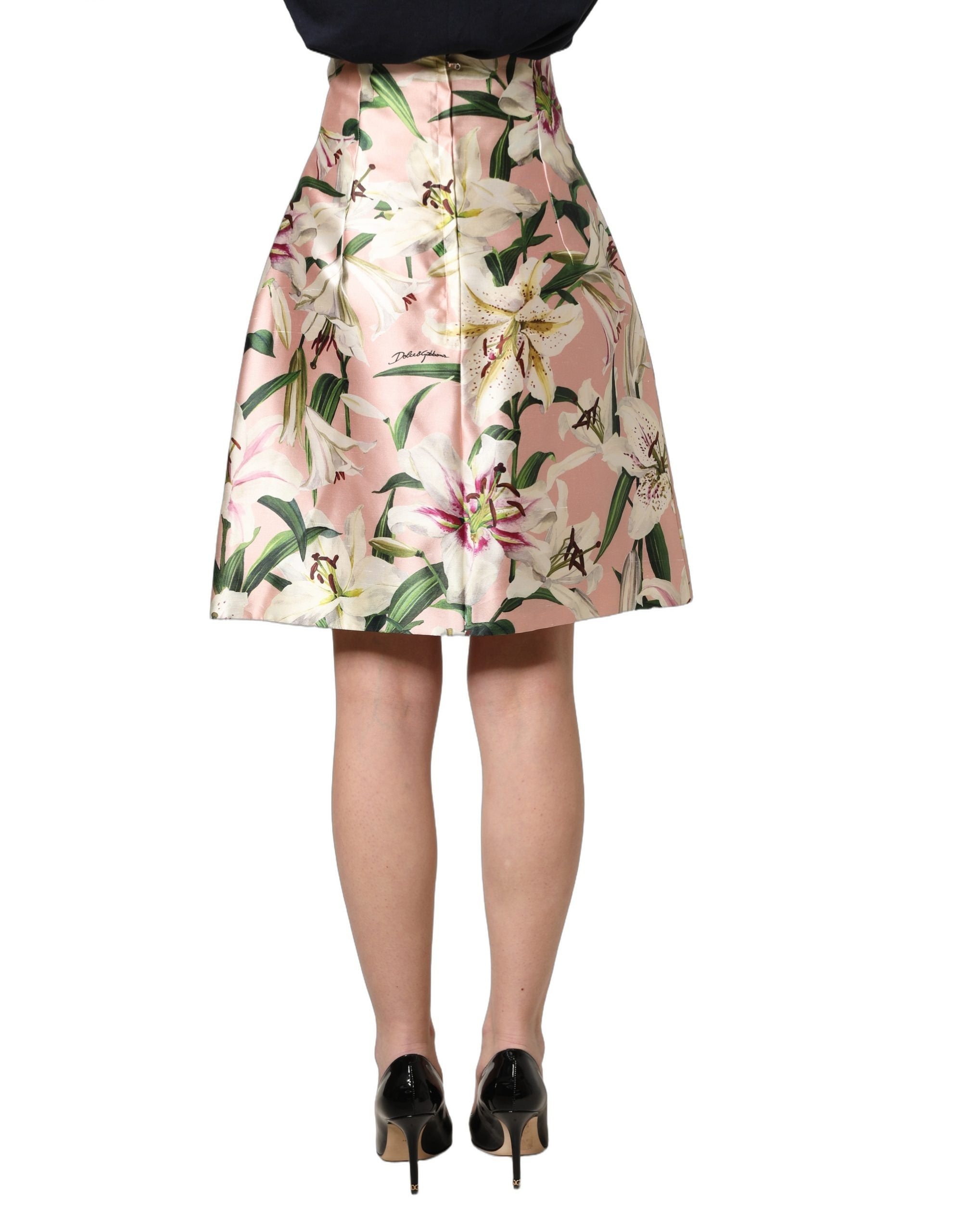Indulge in the exquisite allure of the Dolce & Gabbana Pink Lilium High Waist Knee Length Skirt, crafted from luxurious silk, embodying elegance and sophistication for the discerning individual.