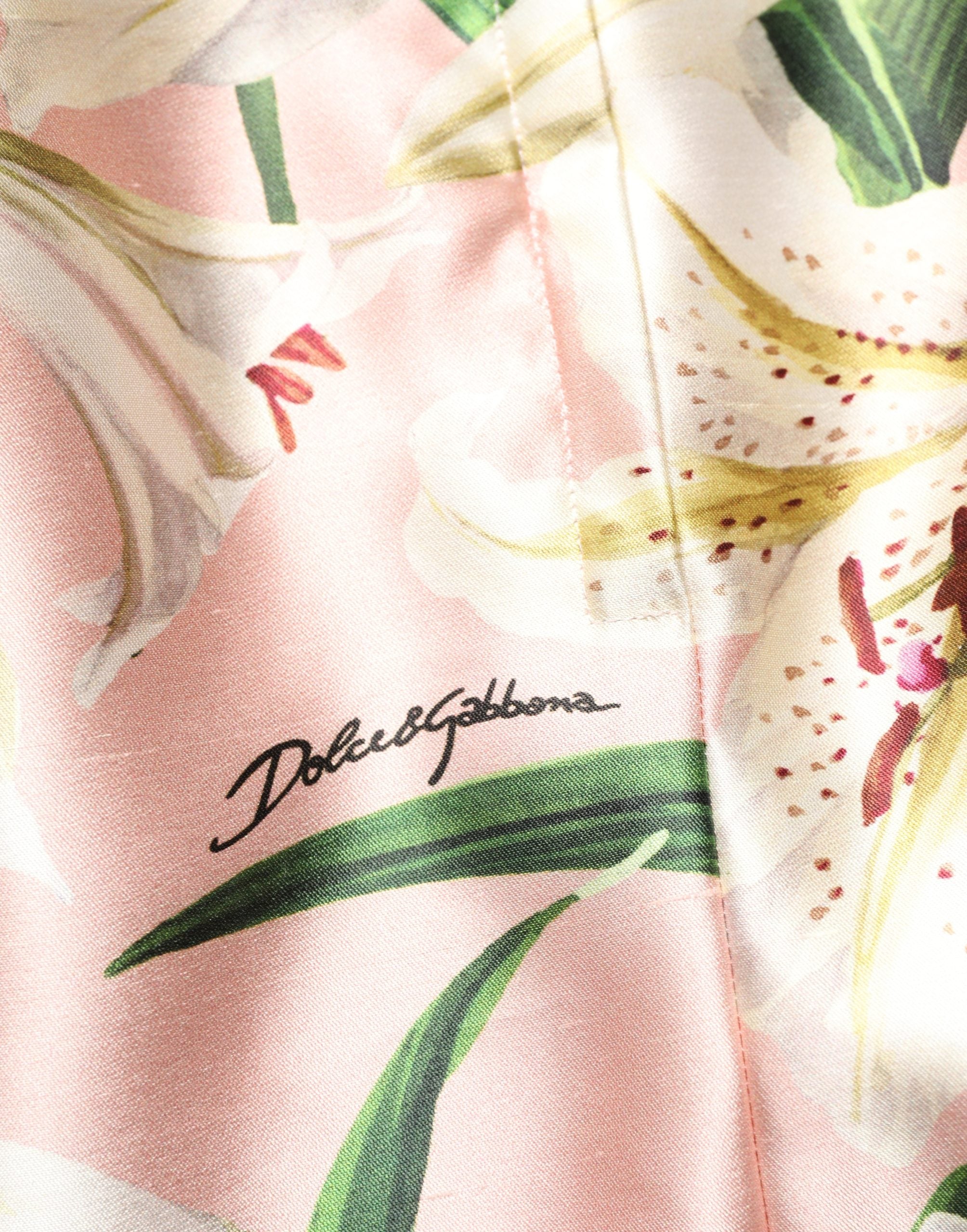 Elevate your wardrobe with the Dolce & Gabbana Pink Lilium High Waist Knee Length Skirt, a masterpiece in luxurious silk, embodying refined elegance and timeless allure.