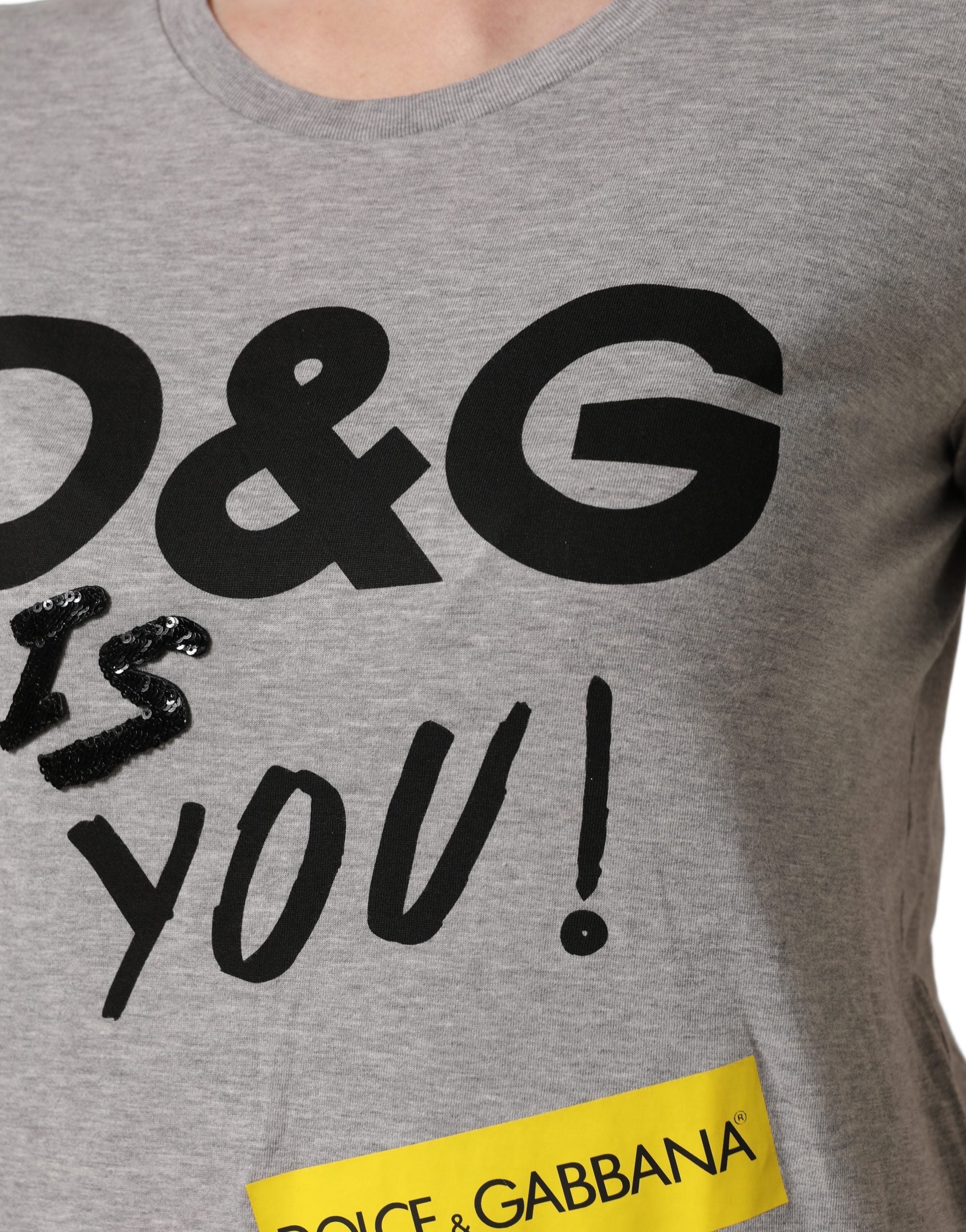 Experience the allure of the Dolce & Gabbana Gray Cotton Logo Printed Crew Neck T-shirt, a timeless piece of Italian craftsmanship that elevates everyday elegance.