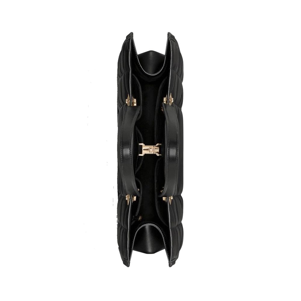 Indulge in the elegance of the Dior Black Leather Tote Bag, crafted from 100% leather with a sumptuous suede lining, embodying luxury and sophistication for the discerning individual.