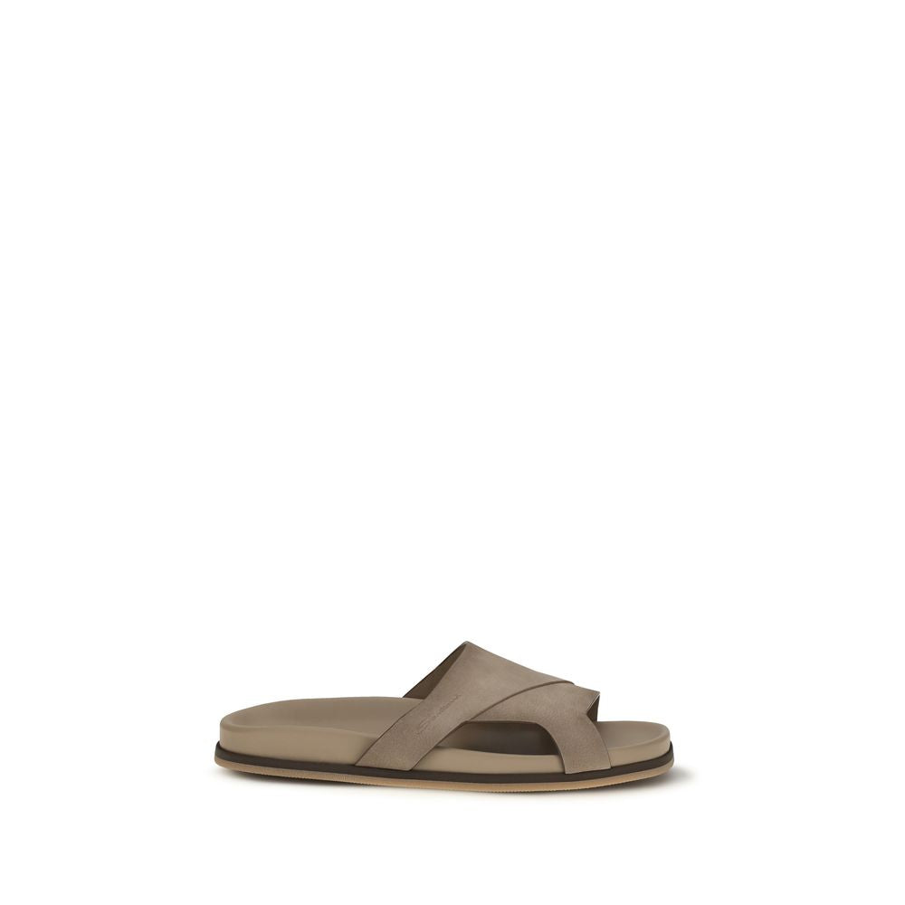Indulge in the Santoni Beige Calf Leather Bos Taurus Flat Sandals, a testament to exquisite craftsmanship and timeless elegance, perfect for elevating any summer ensemble.