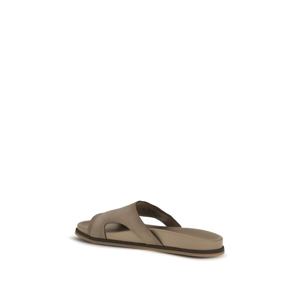 Elevate your summer elegance with Santoni Beige Calf Leather Bos Taurus Flat Sandals, where exquisite craftsmanship meets luxurious comfort for the discerning individual.
