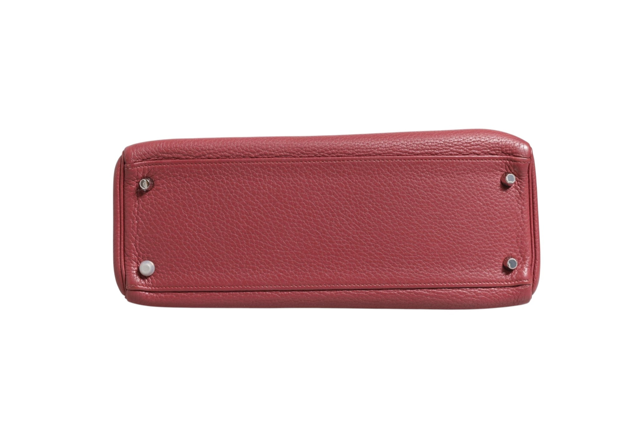Discover the Hermès Kelly 32 in Rouge H Togo Retourne Palladium, a symbol of luxury craftsmanship and timeless elegance, perfect for any sophisticated occasion.