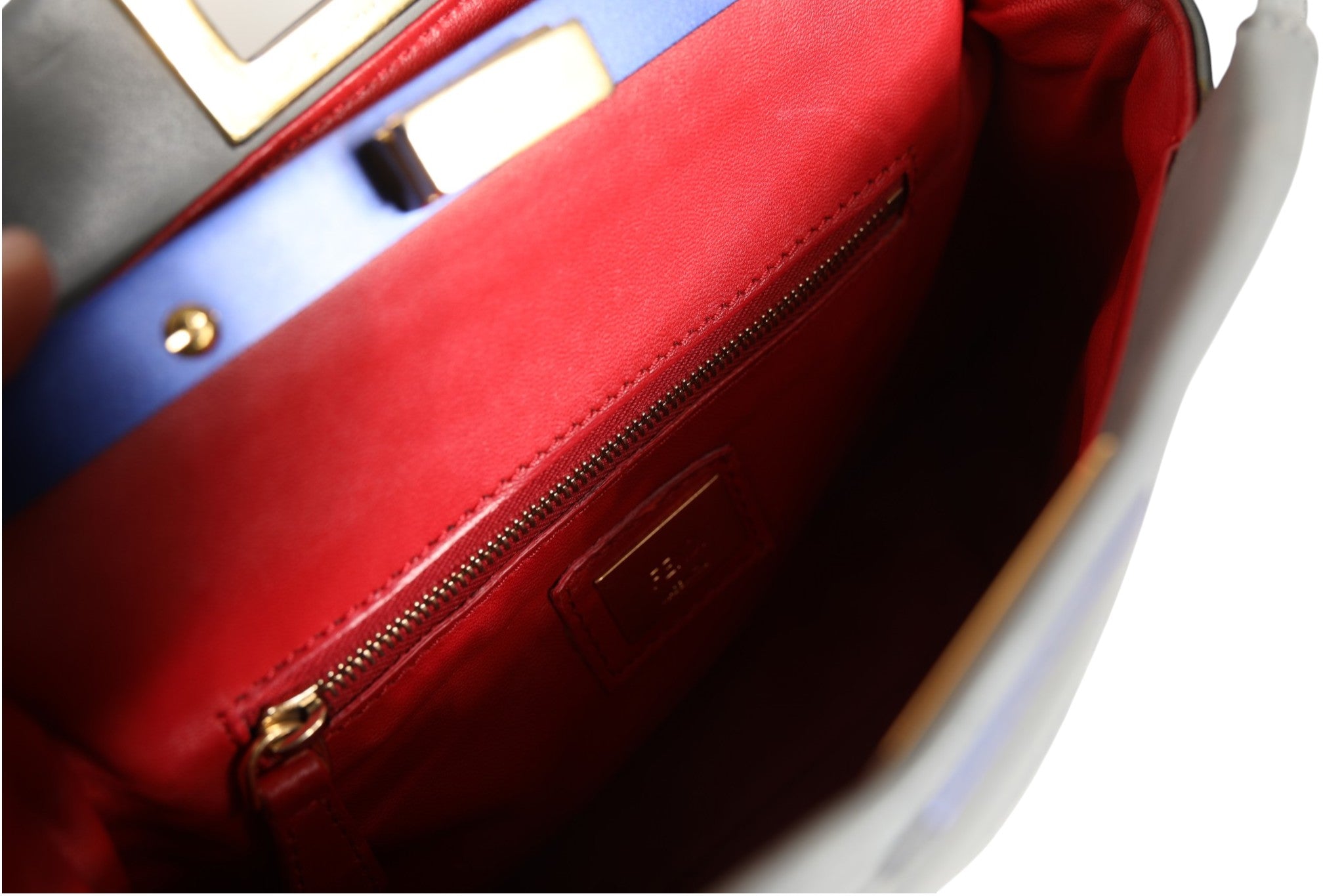 Discover the Fendi Mini Peekaboo Blue Grey, a masterpiece of Italian craftsmanship that embodies timeless elegance and sophistication for the discerning individual.
