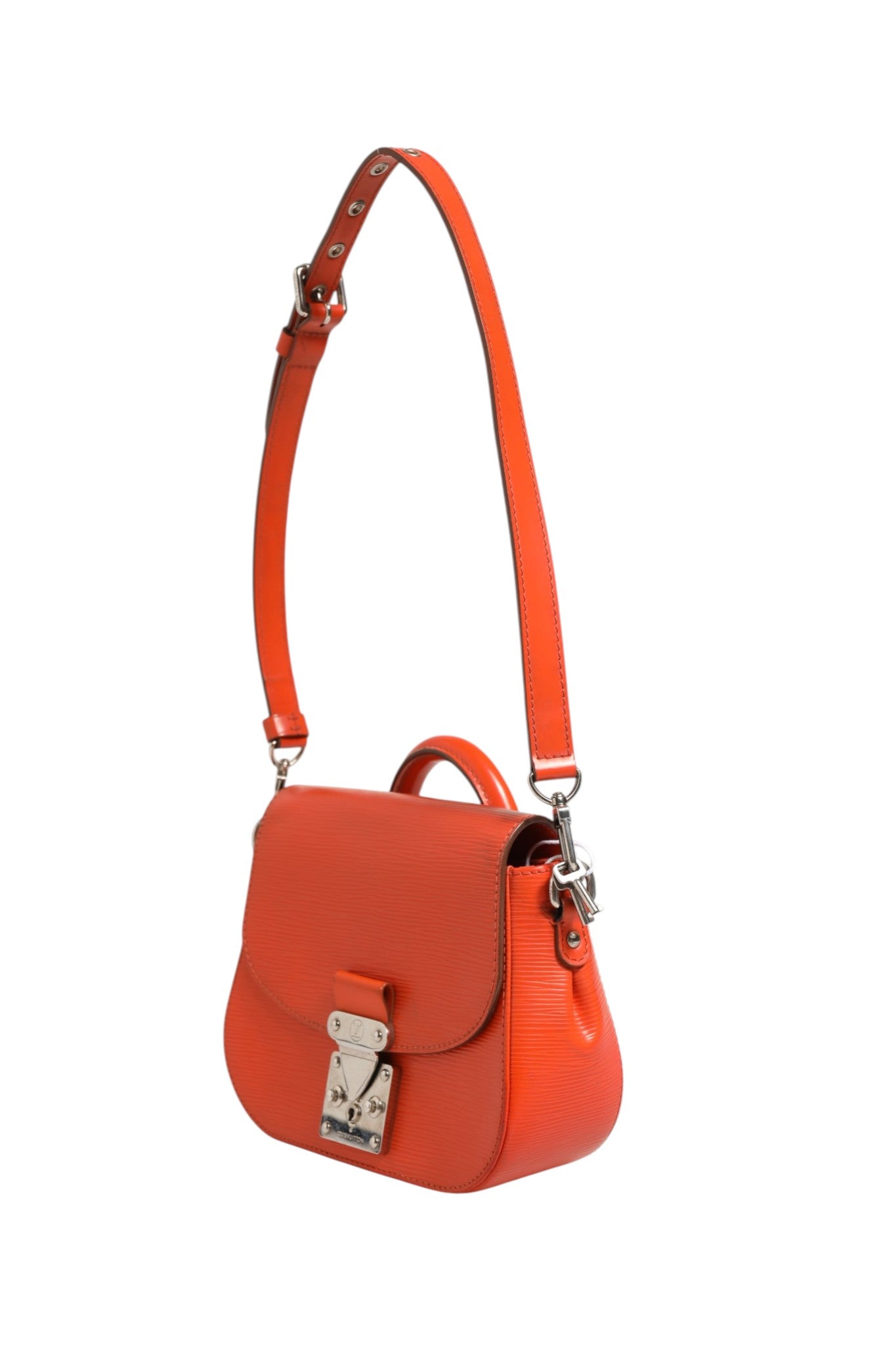 Indulge in the allure of the Louis Vuitton Epi Leather Eden PM Bag, where exquisite craftsmanship meets vibrant orange elegance, perfect for elevating any occasion.