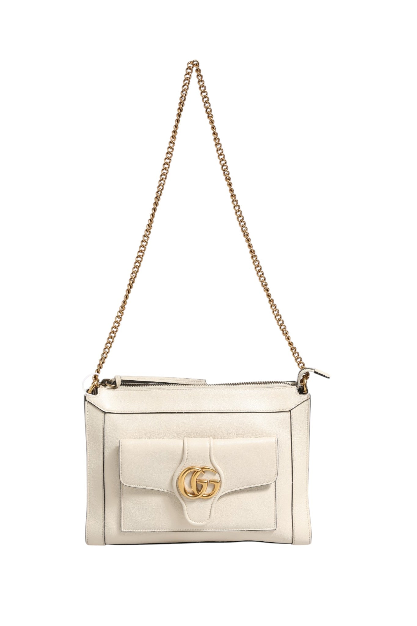 Experience the exquisite allure of the Gucci Arli Small Crossbody Bag, crafted in sumptuous off-white leather, a timeless accessory that embodies luxury and sophistication.