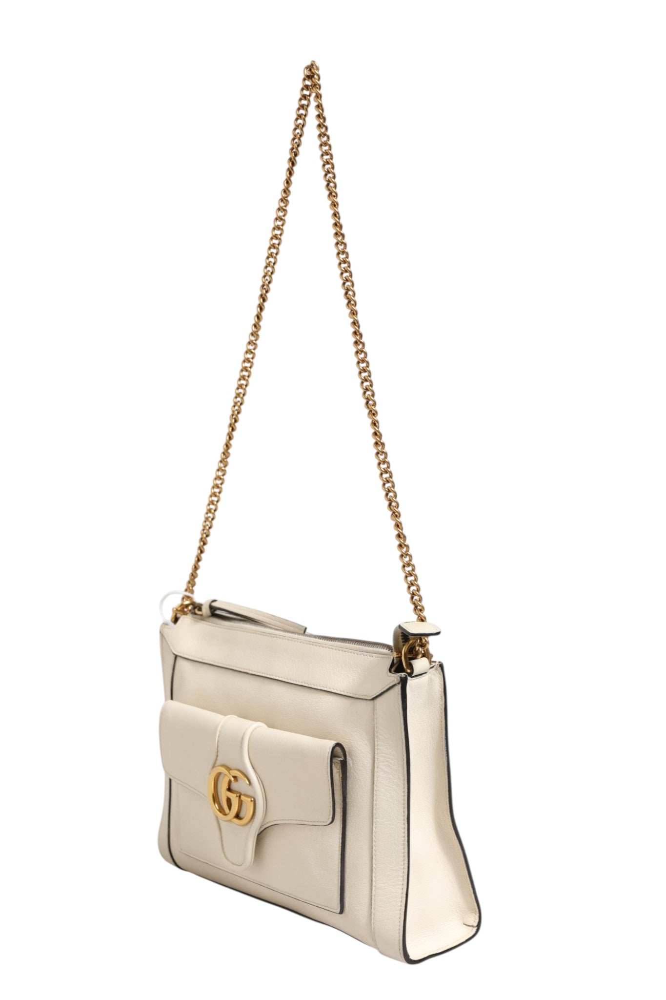 Elevate your style with the Gucci Arli Small Crossbody Bag, a masterpiece in off-white leather, embodying timeless elegance and exquisite craftsmanship for the discerning individual.