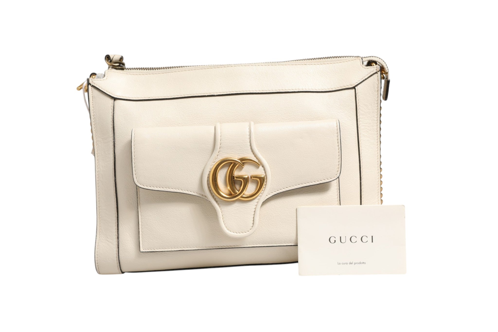 Discover the Gucci Arli Small Crossbody Bag in sumptuous off-white leather, a symbol of elegance and sophistication, perfect for the discerning connoisseur.