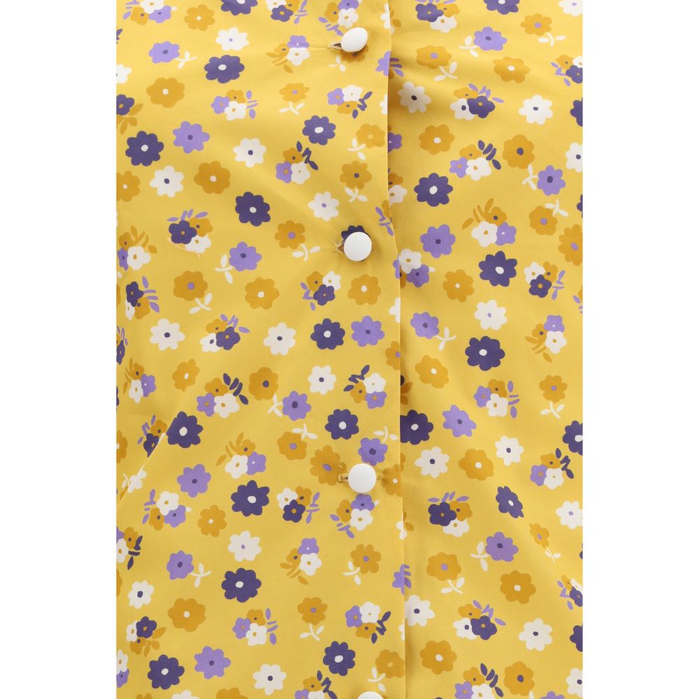 Discover the Miu Miu Bicolor Cotton Casual Dress, a floral masterpiece in 100% cotton from the SS26 collection, embodying elegance and timeless allure for every occasion.