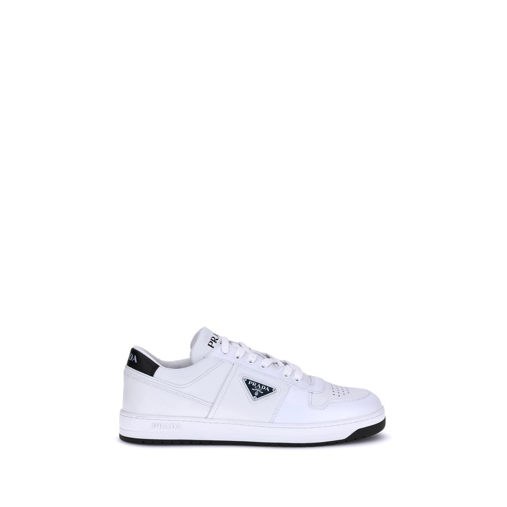 Discover the Prada White Calf Leather Bos Taurus Low Top Sneakers, a fusion of exquisite craftsmanship and contemporary elegance, perfect for the discerning individual.
