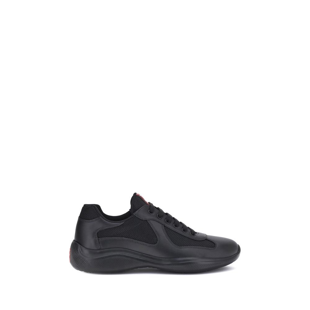 Elevate your style with Prada Black Polyamide Sneakers, a seamless blend of luxury and modern design, crafted for those who embody sophistication and elegance.