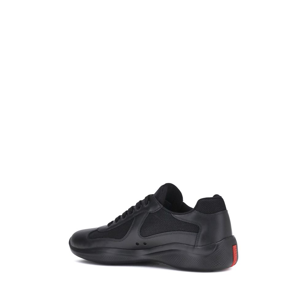 Experience the allure of Prada's Black Polyamide Sneakers, crafted from luxurious materials for a sophisticated touch that elevates every step in your journey.