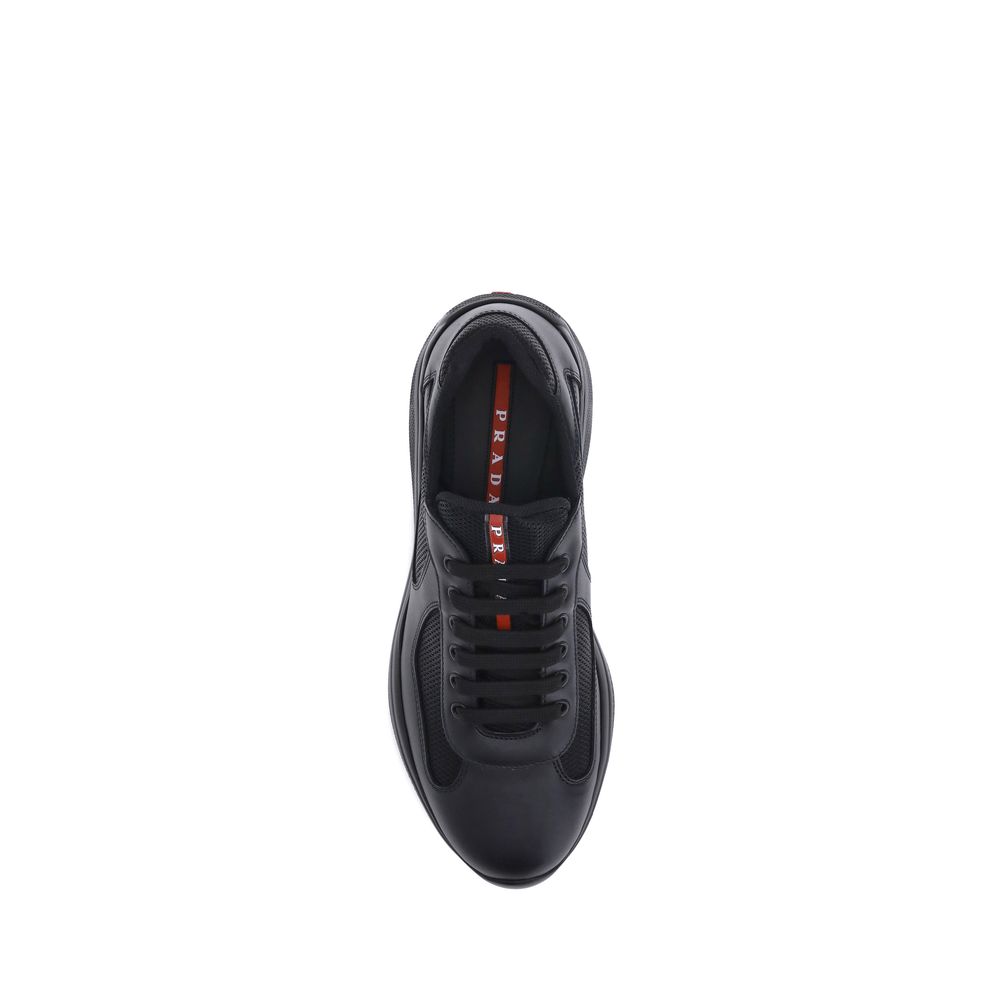 Elevate your style with Prada Black Polyamide Sneakers, a seamless blend of luxury and comfort crafted from exquisite materials, perfect for the discerning individual.