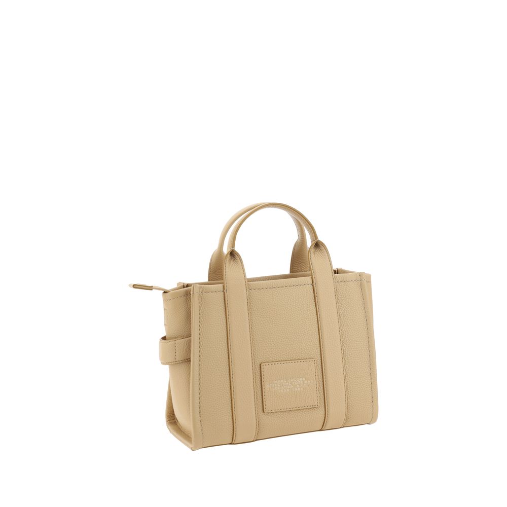Elevate your style with the Marc Jacobs Beige Calf Leather Bos Taurus Handbag, a masterpiece of artisanal luxury and timeless elegance, perfect for the discerning individual.