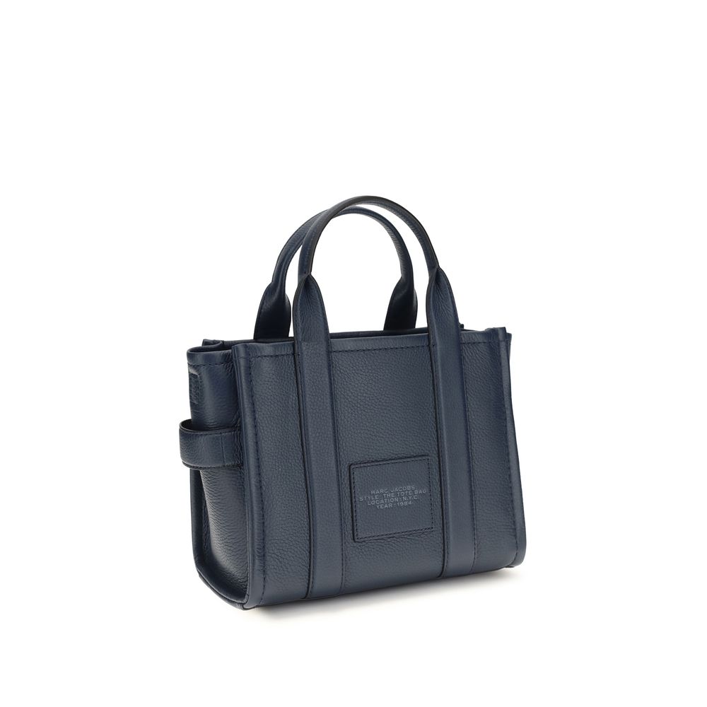 Indulge in the exquisite allure of the Marc Jacobs Blue Calf Leather Bos Taurus Handbag, a timeless masterpiece of craftsmanship and elegance for the discerning connoisseur.