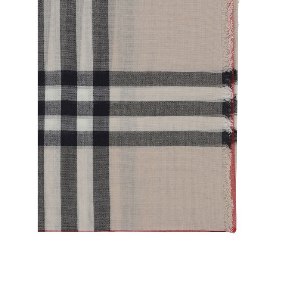 Indulge in the Burberry Brown Silk Scarf from the AW26 collection, a luxurious silk wool-blend masterpiece that elevates any ensemble with timeless elegance and sophistication.