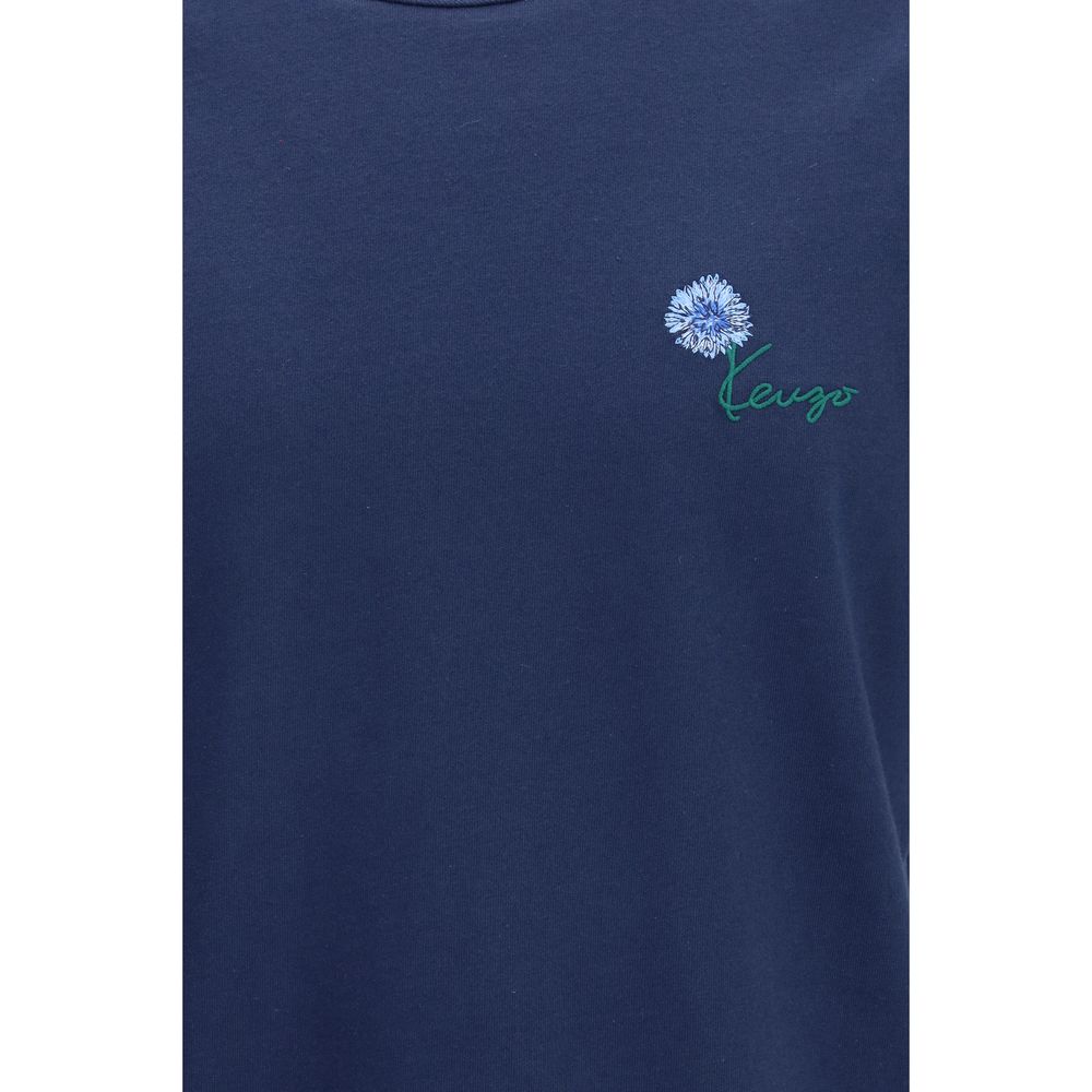 Elevate your wardrobe with the Kenzo Blue Cotton T-Shirt, featuring exquisite Tulip embroidery and crafted from 100% cotton for unmatched sophistication and style.