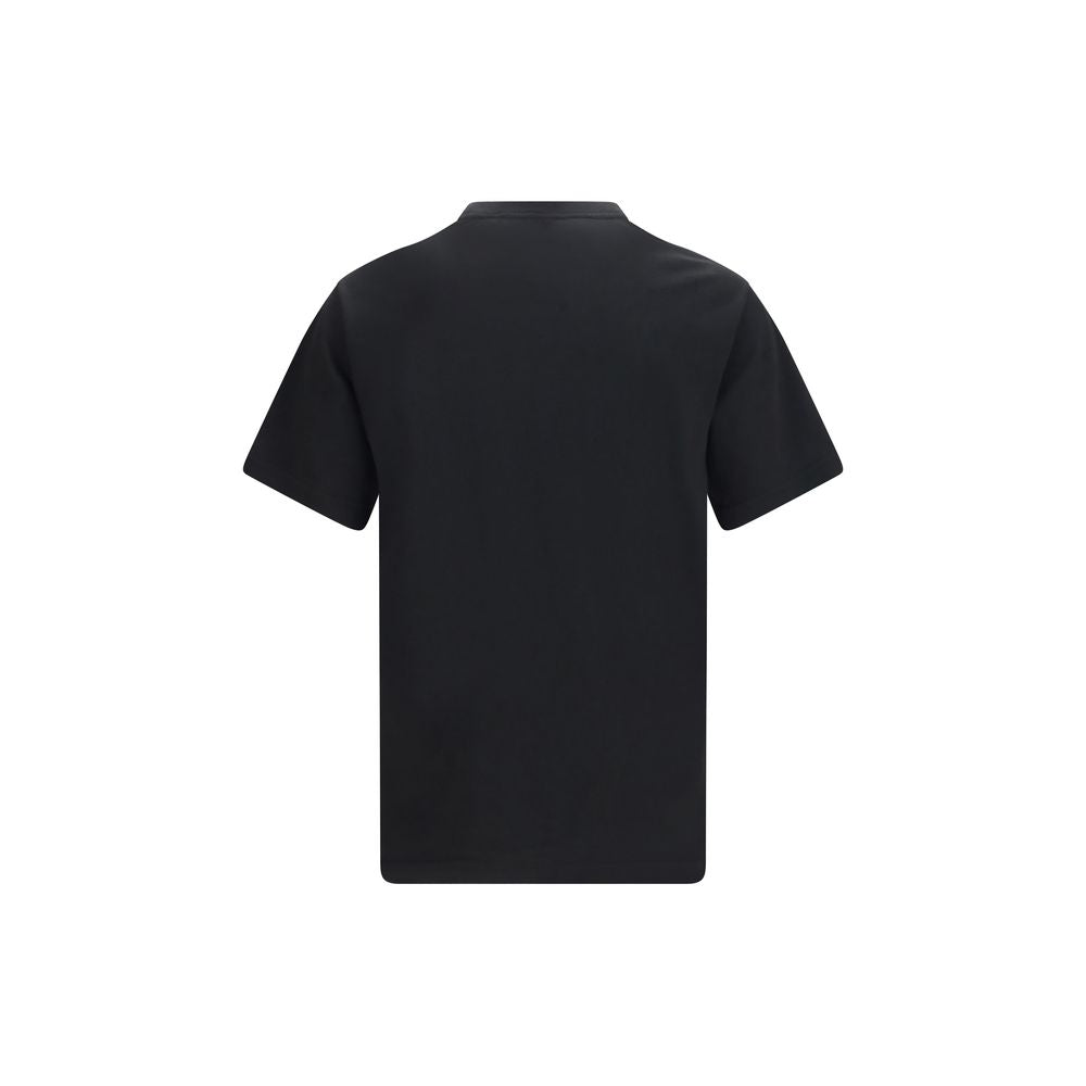 Elevate your wardrobe with the Kenzo Black Cotton T-Shirt, a luxurious blend of comfort and sophistication, embodying timeless elegance for discerning tastes.