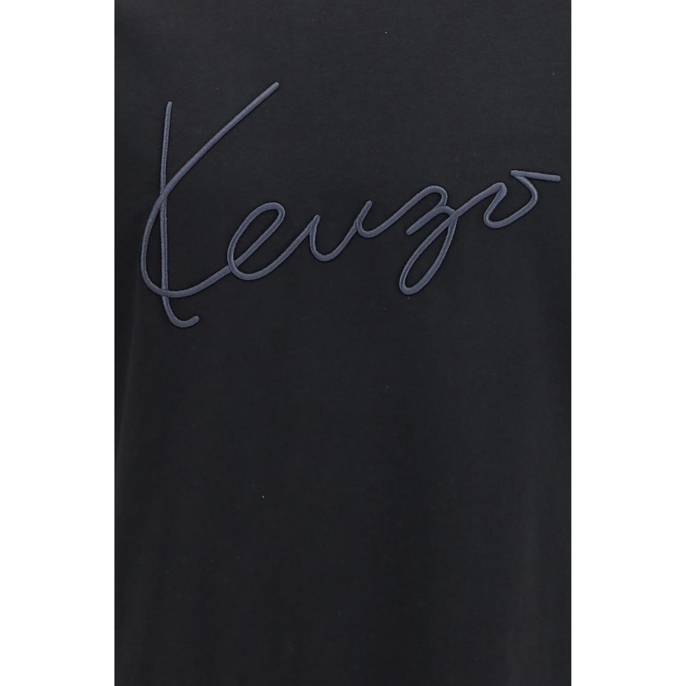Elevate your wardrobe with the Kenzo Black Cotton T-Shirt, a luxurious blend of comfort and sophistication, embodying timeless elegance for the discerning individual.